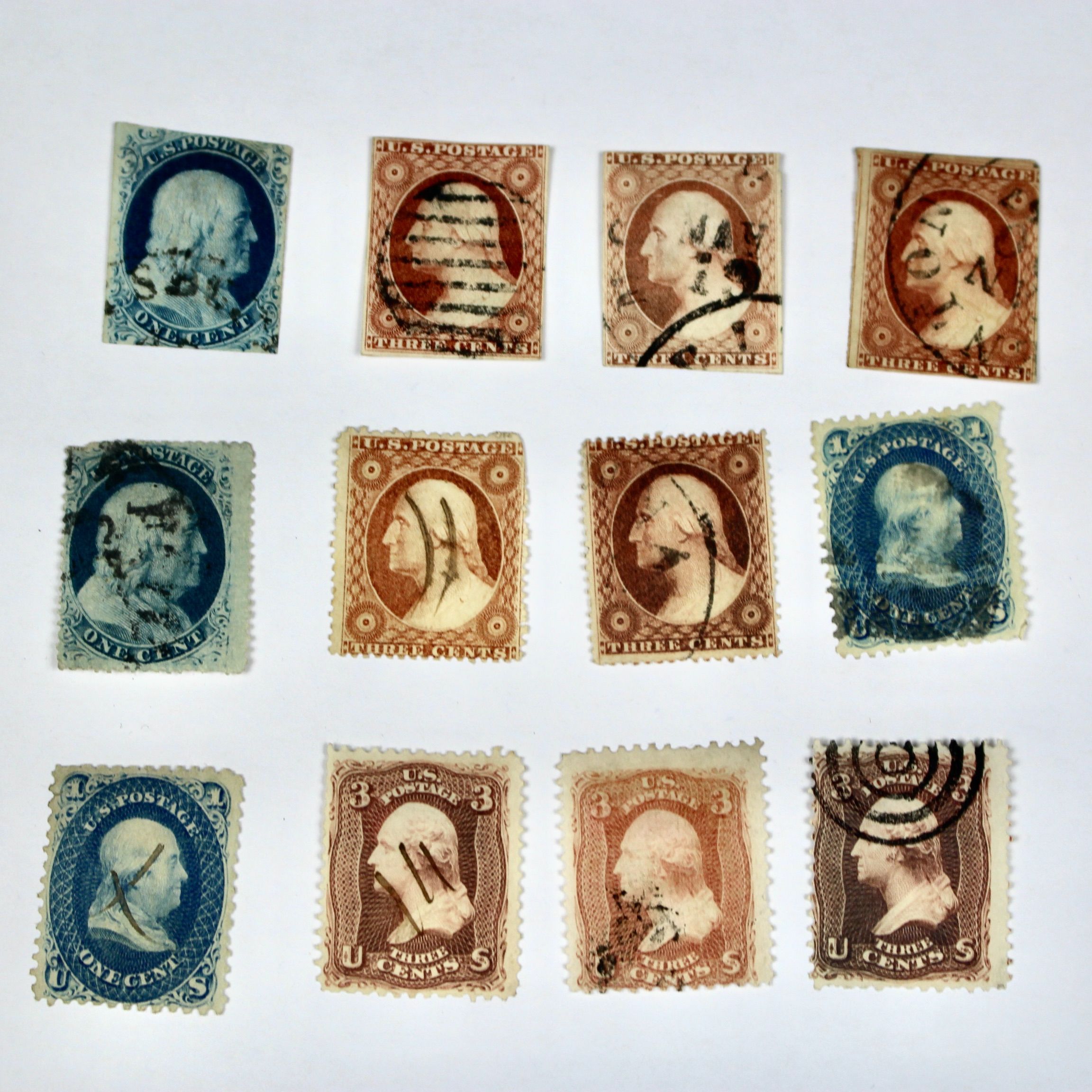 Twenty-Five Early U.S. Postage Stamps, Many with Grills
