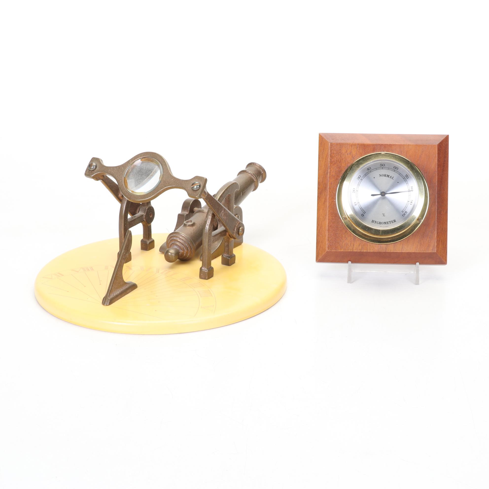 The High Noon Cannon Sundial and Barometer