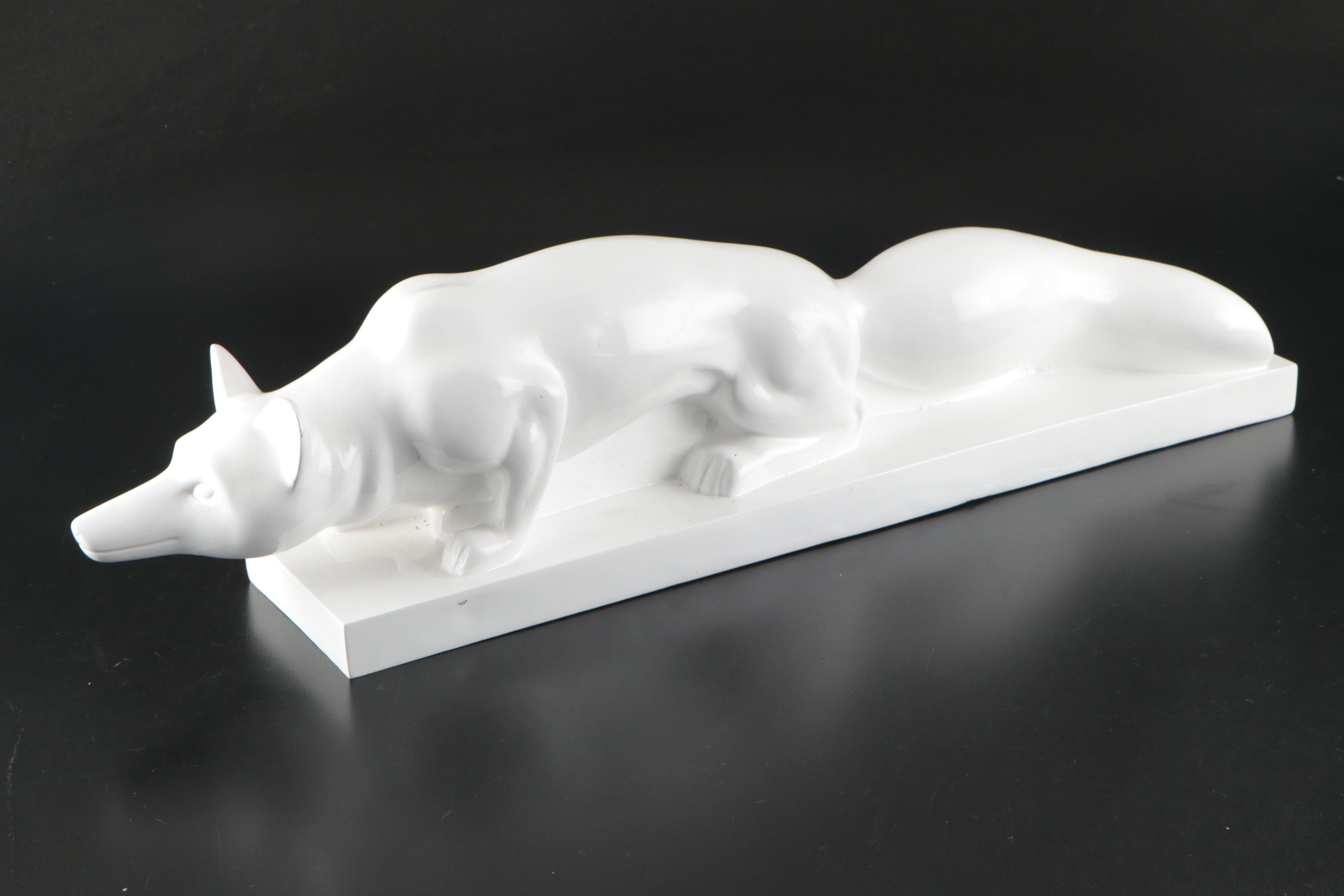 Resin Fox with White Ceramic Figurine