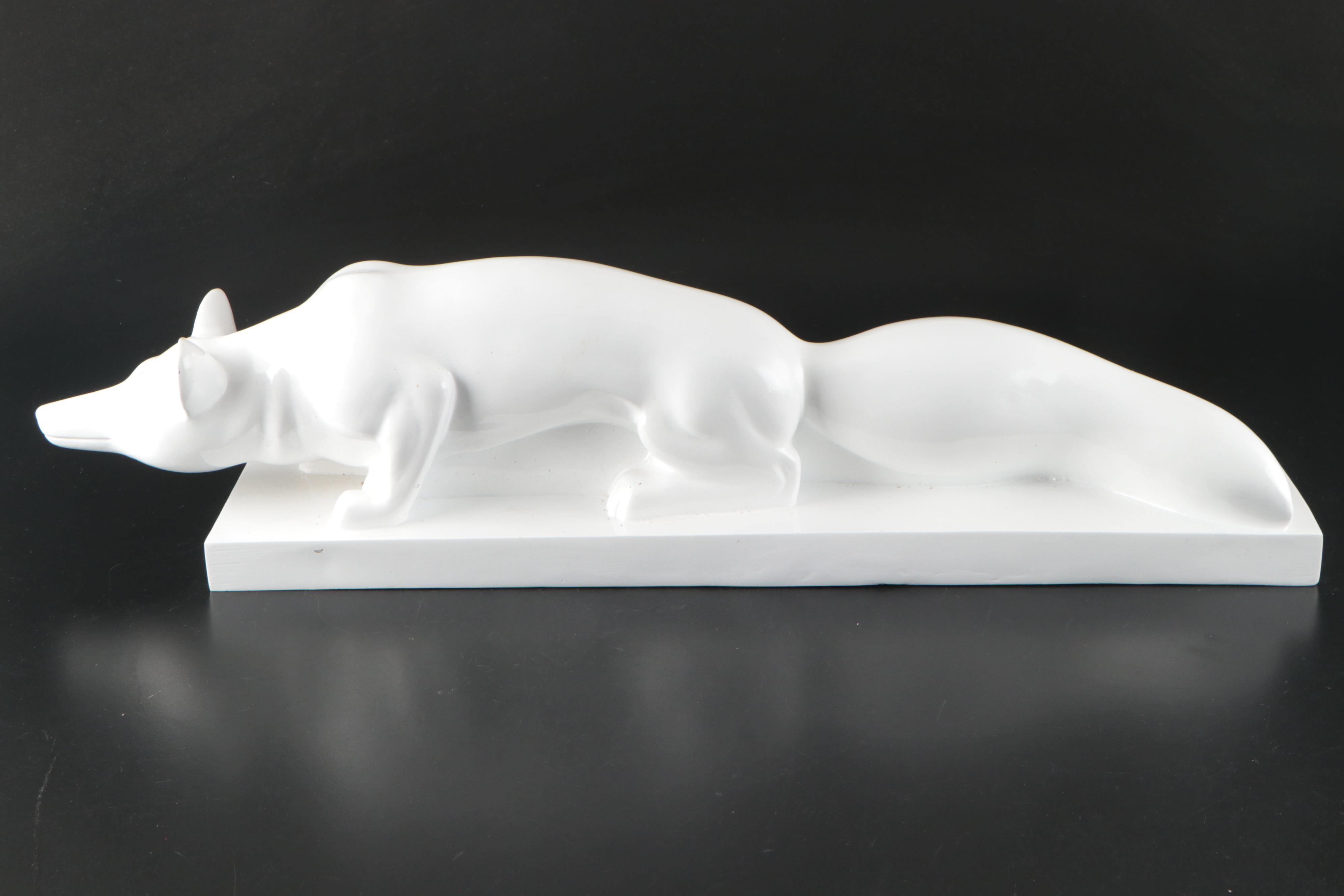 Resin Fox with White Ceramic Figurine