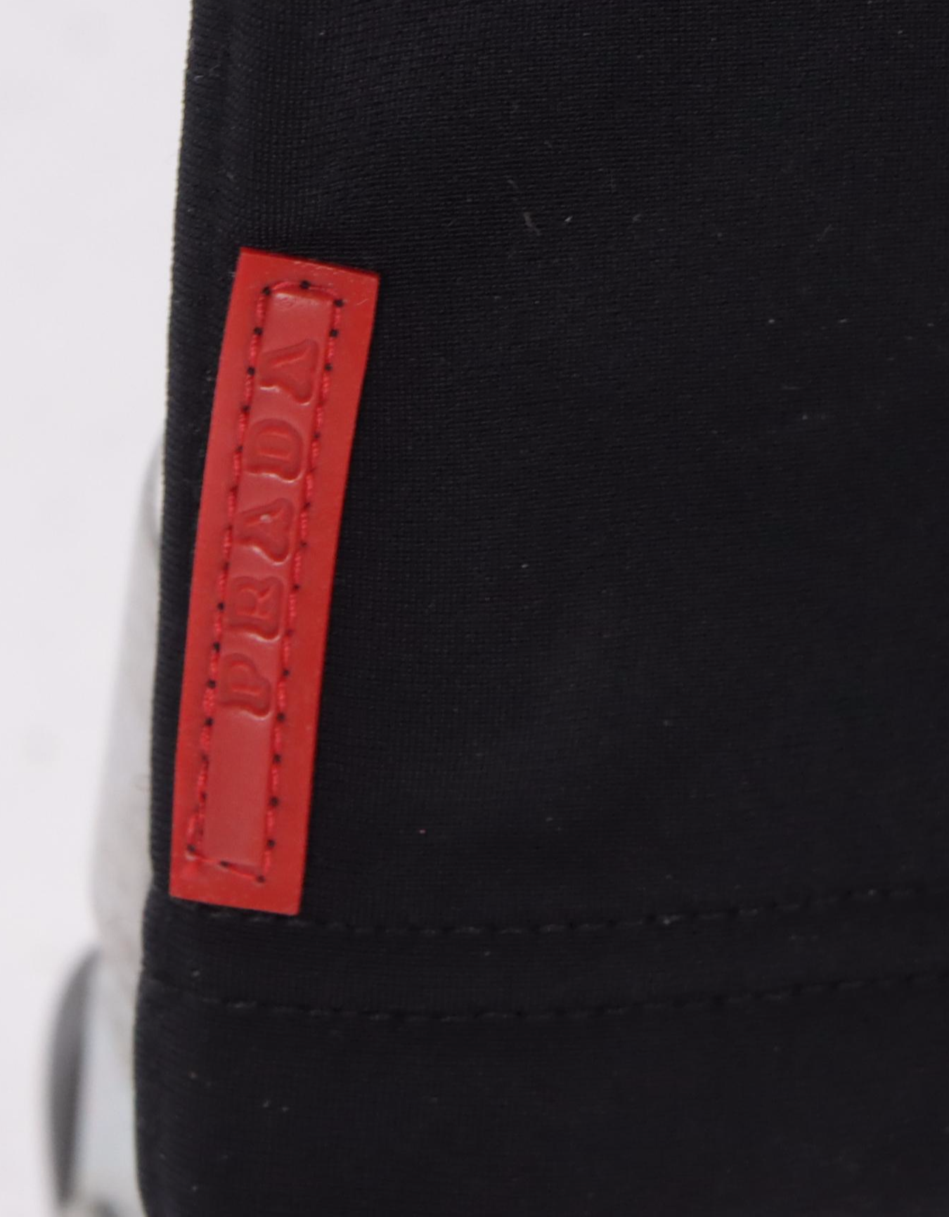 Prada Sport Pants in Stretch Wool Gabardine and Lululemon Leggings in Nylon