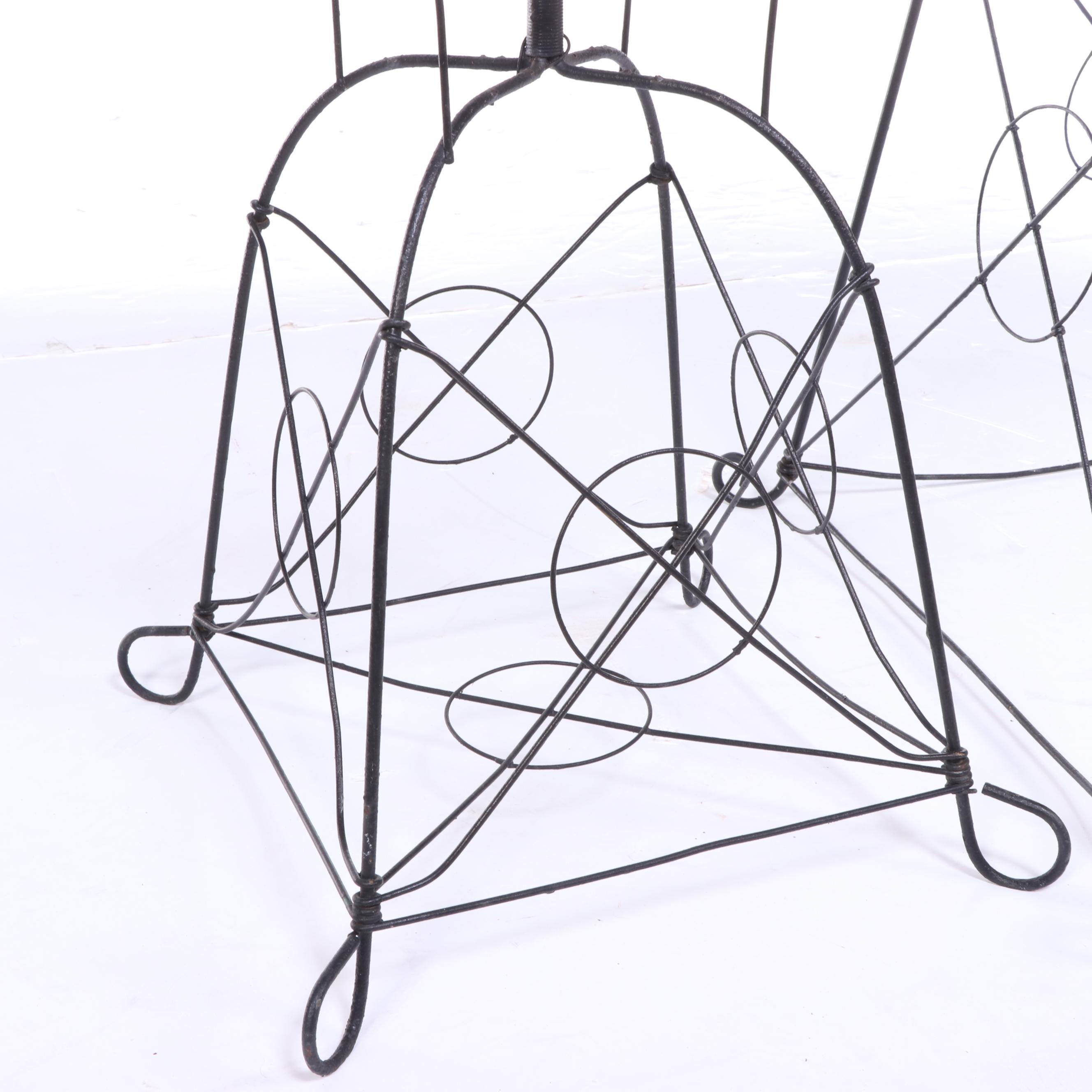 Two Late Victorian Black-Painted Wirework Plant Stands