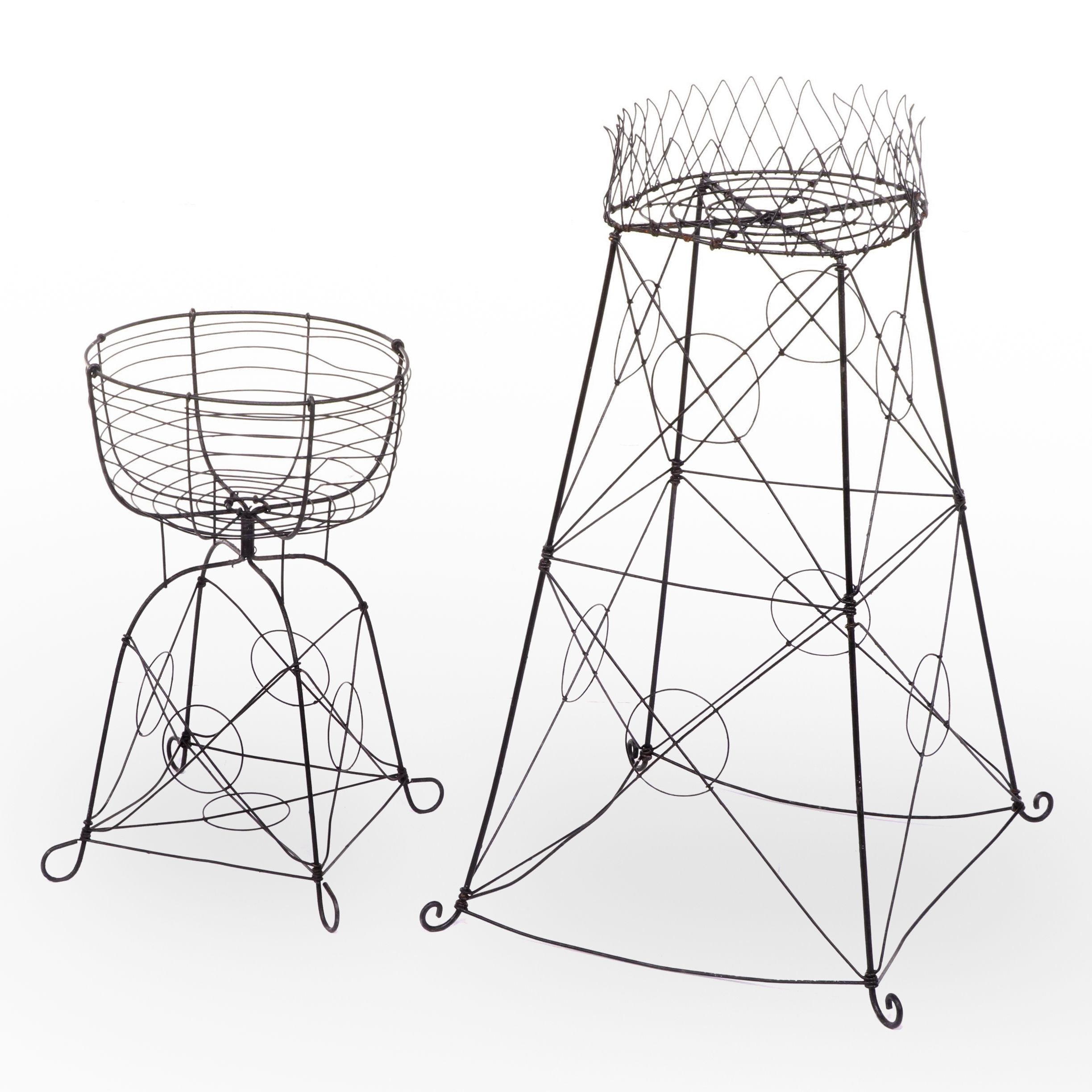 Two Late Victorian Black-Painted Wirework Plant Stands