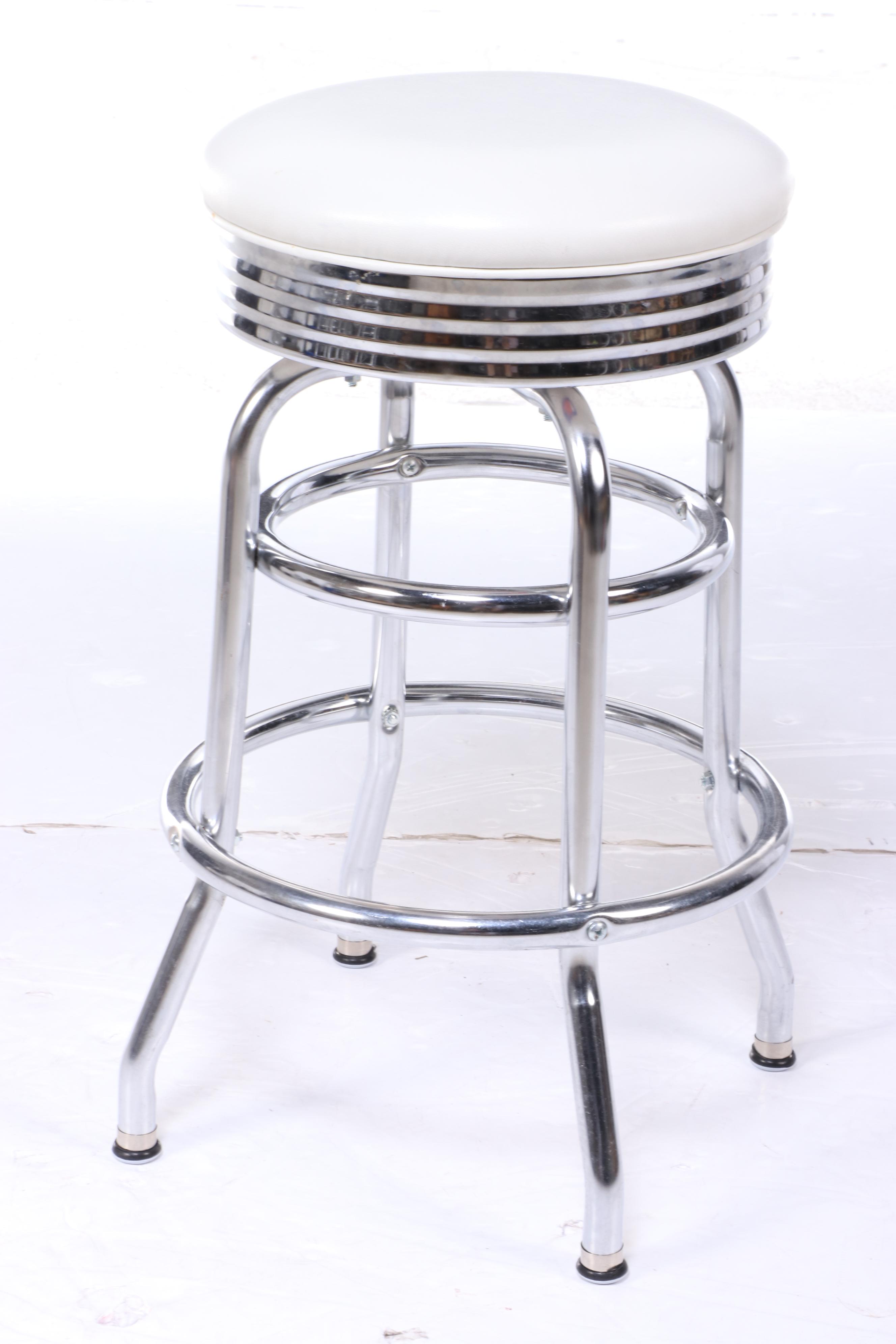 Four Regal Mfg. Co. Modernist Style Chrome and Vinyl Swivel Counter Stools