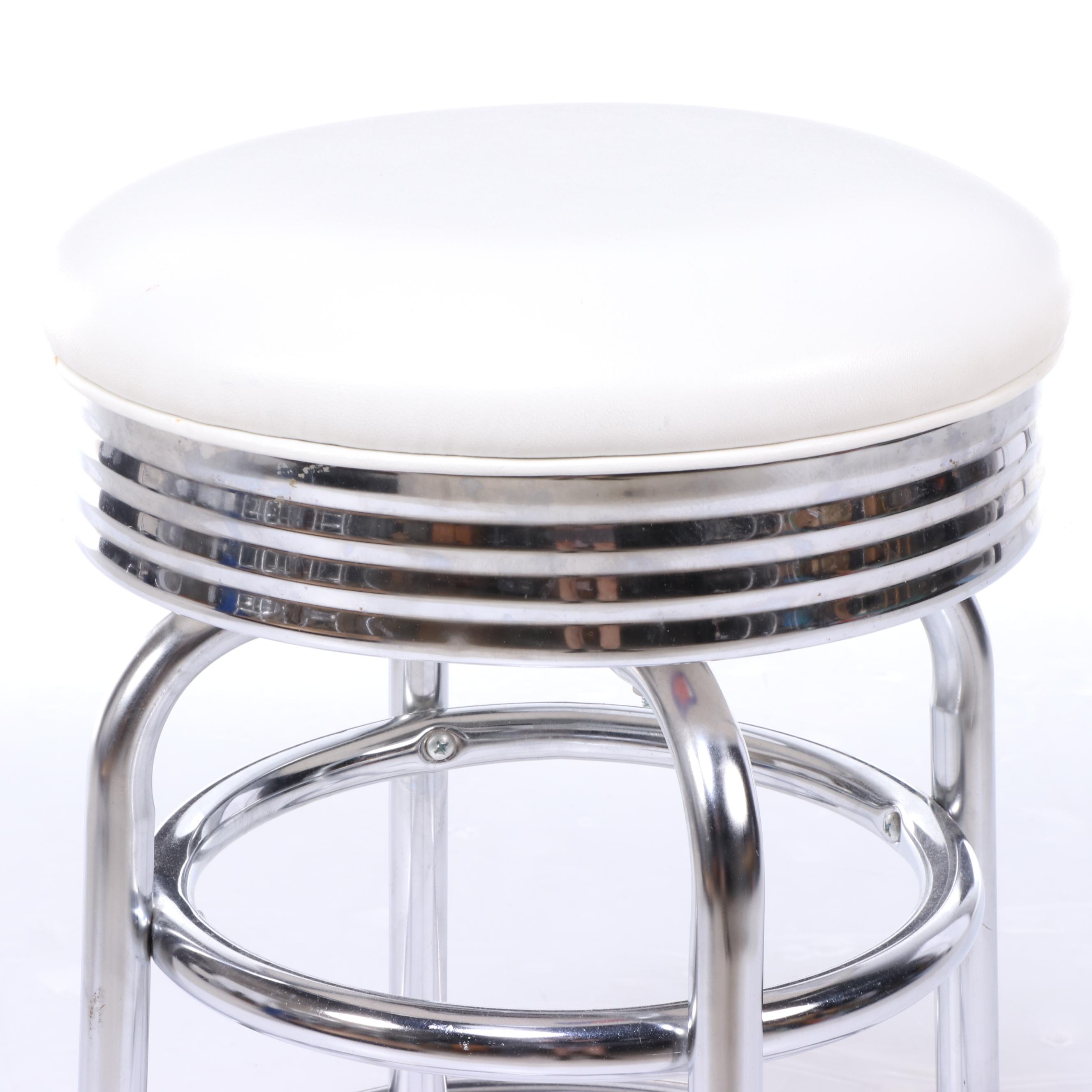 Four Regal Mfg. Co. Modernist Style Chrome and Vinyl Swivel Counter Stools