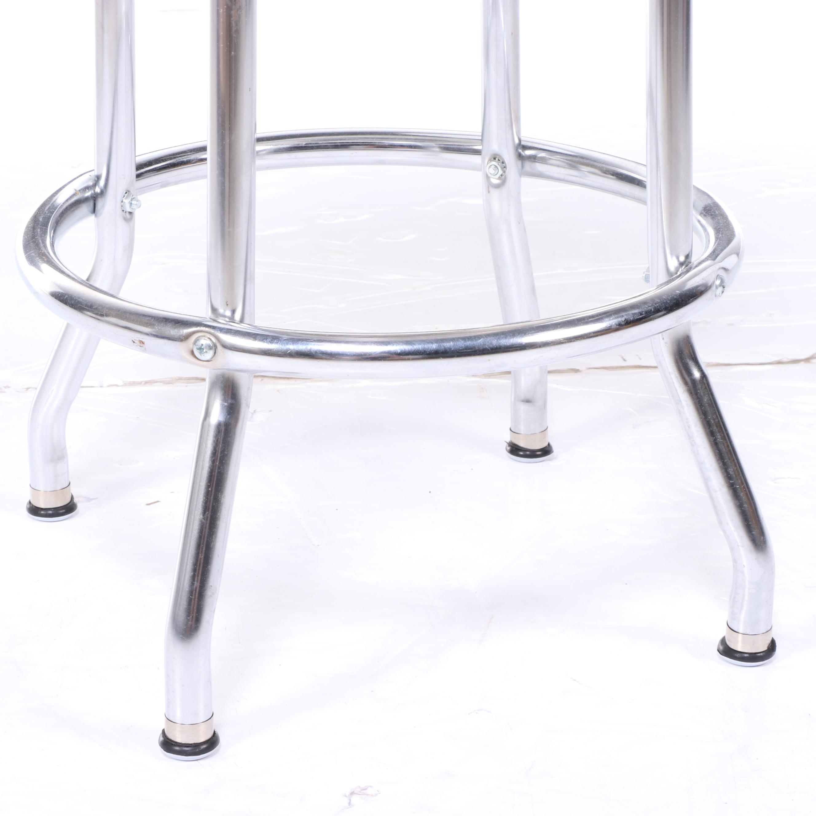 Four Regal Mfg. Co. Modernist Style Chrome and Vinyl Swivel Counter Stools