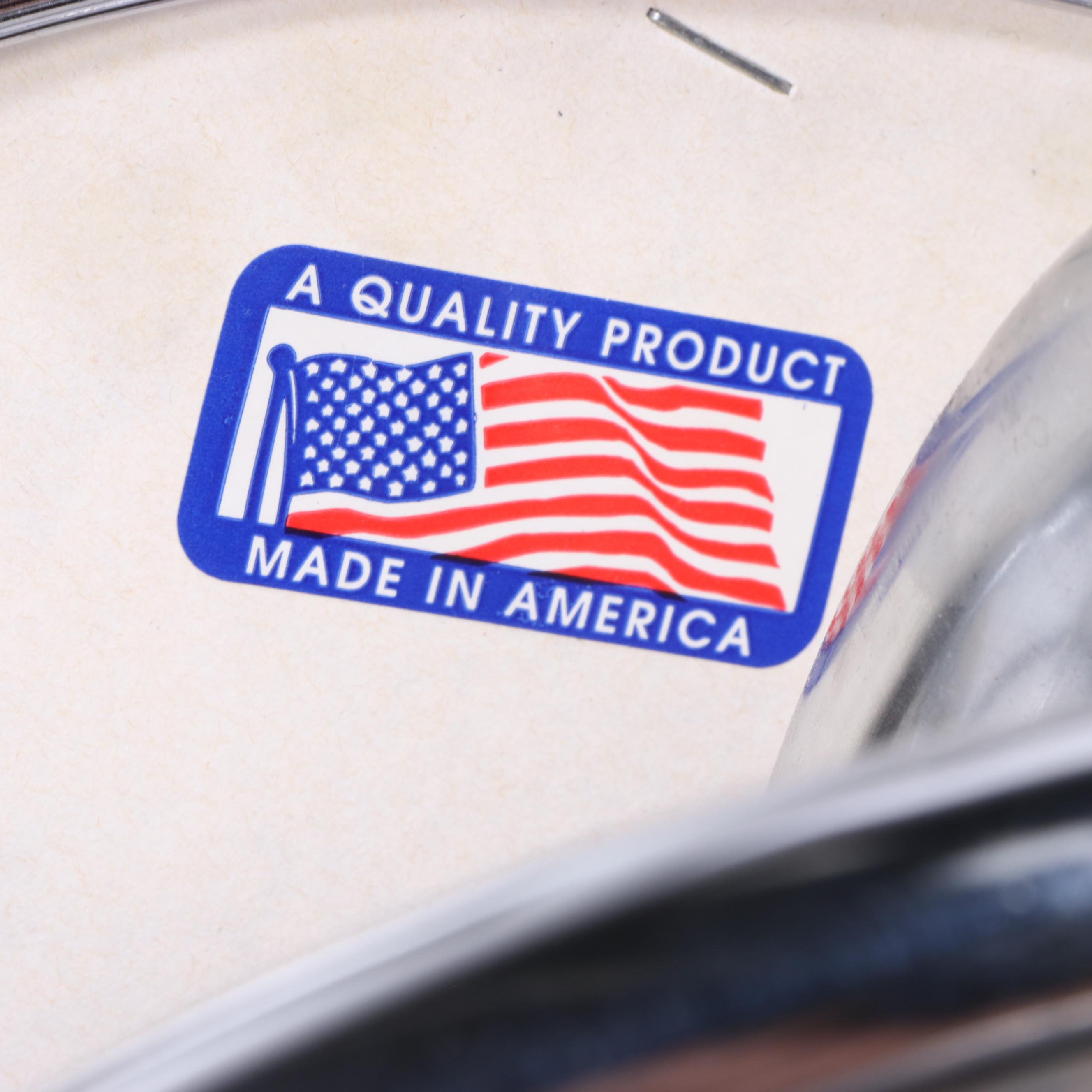 Four Regal Mfg. Co. Modernist Style Chrome and Vinyl Swivel Counter Stools