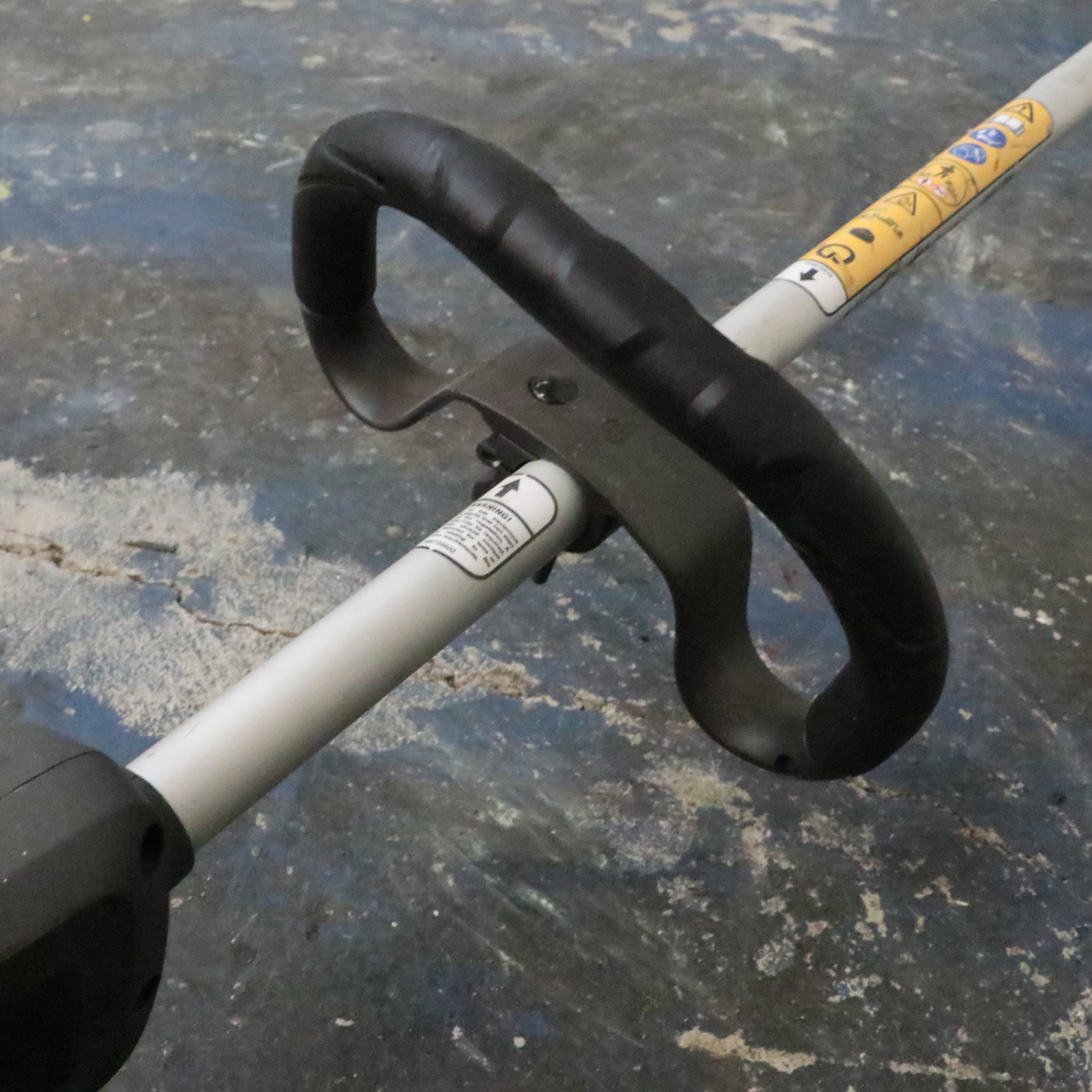 Truper Wheelbarrow With Husqvarna Gas-Powered String Trimmer