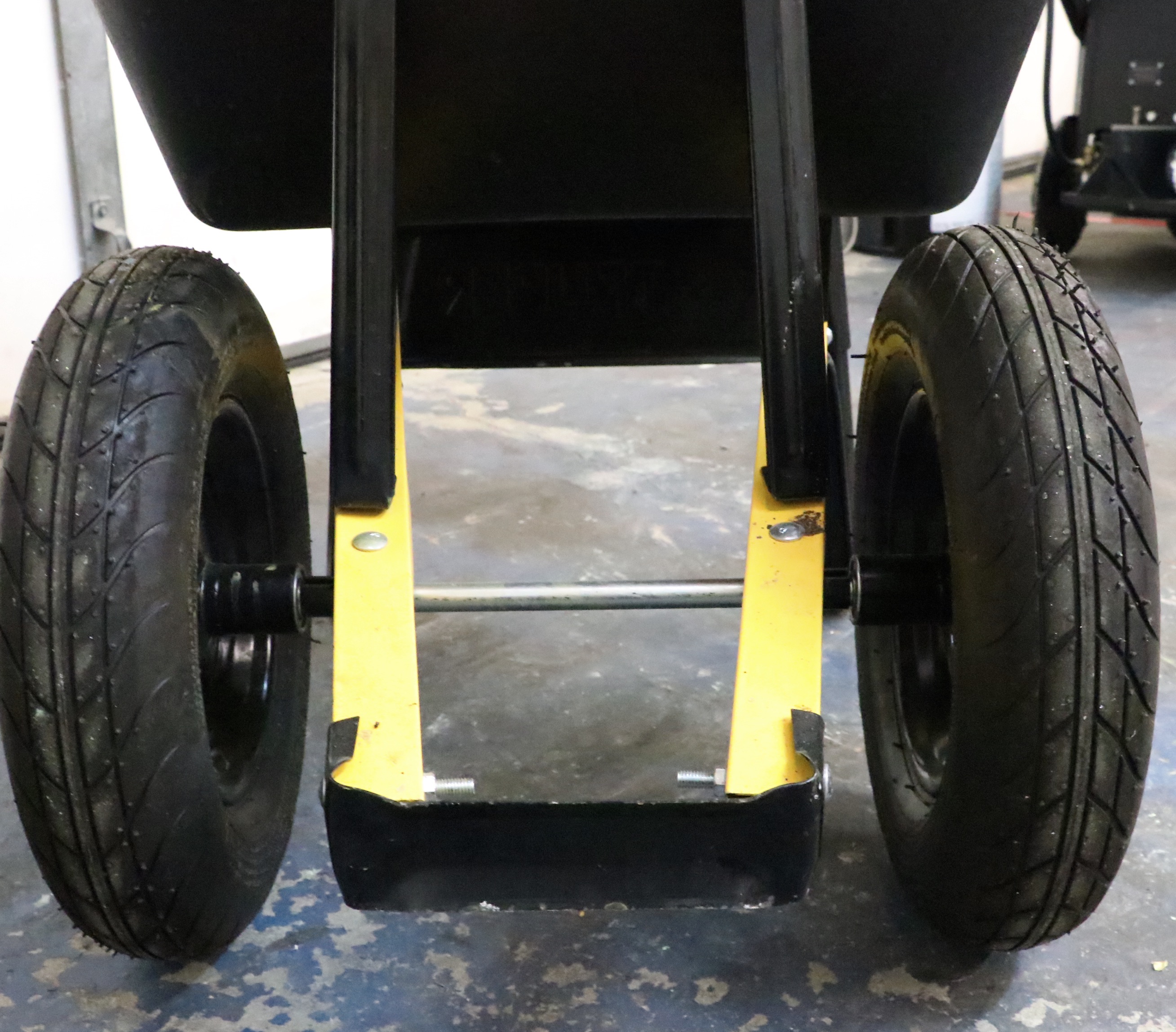 Truper Wheelbarrow With Husqvarna Gas-Powered String Trimmer