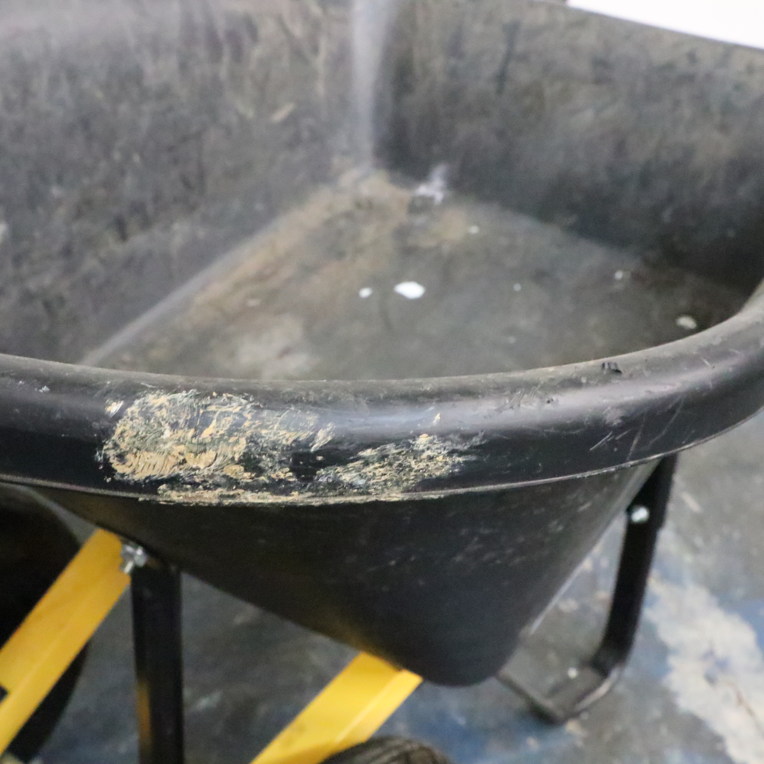 Truper Wheelbarrow With Husqvarna Gas-Powered String Trimmer