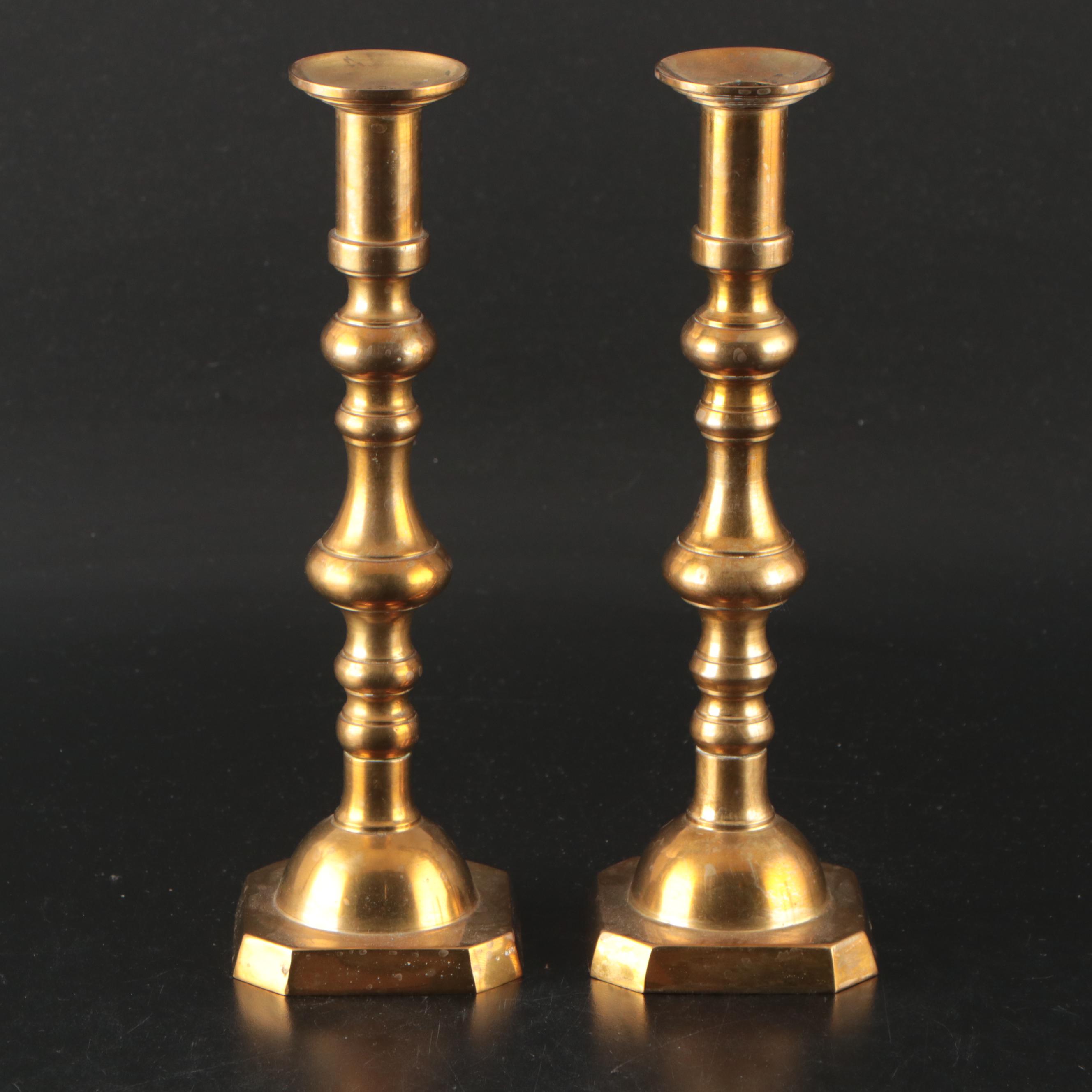 Virginia Metalcrafters "Kings Arms" with Other Brass Trivets and Candlesticks