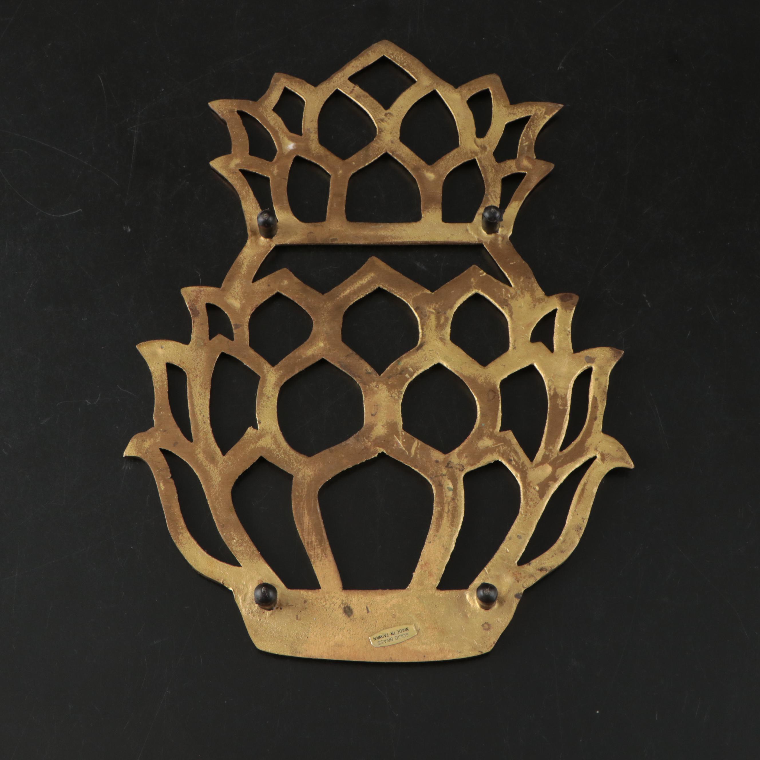 Virginia Metalcrafters "Kings Arms" with Other Brass Trivets and Candlesticks