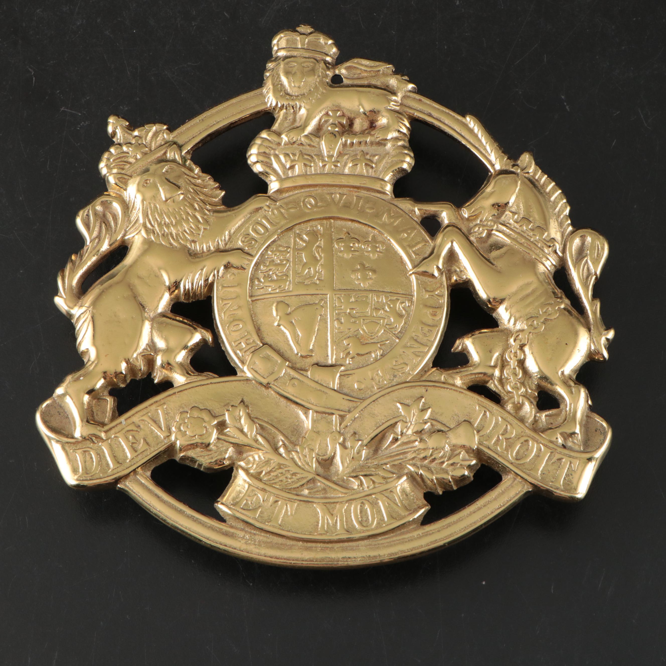 Virginia Metalcrafters "Kings Arms" with Other Brass Trivets and Candlesticks