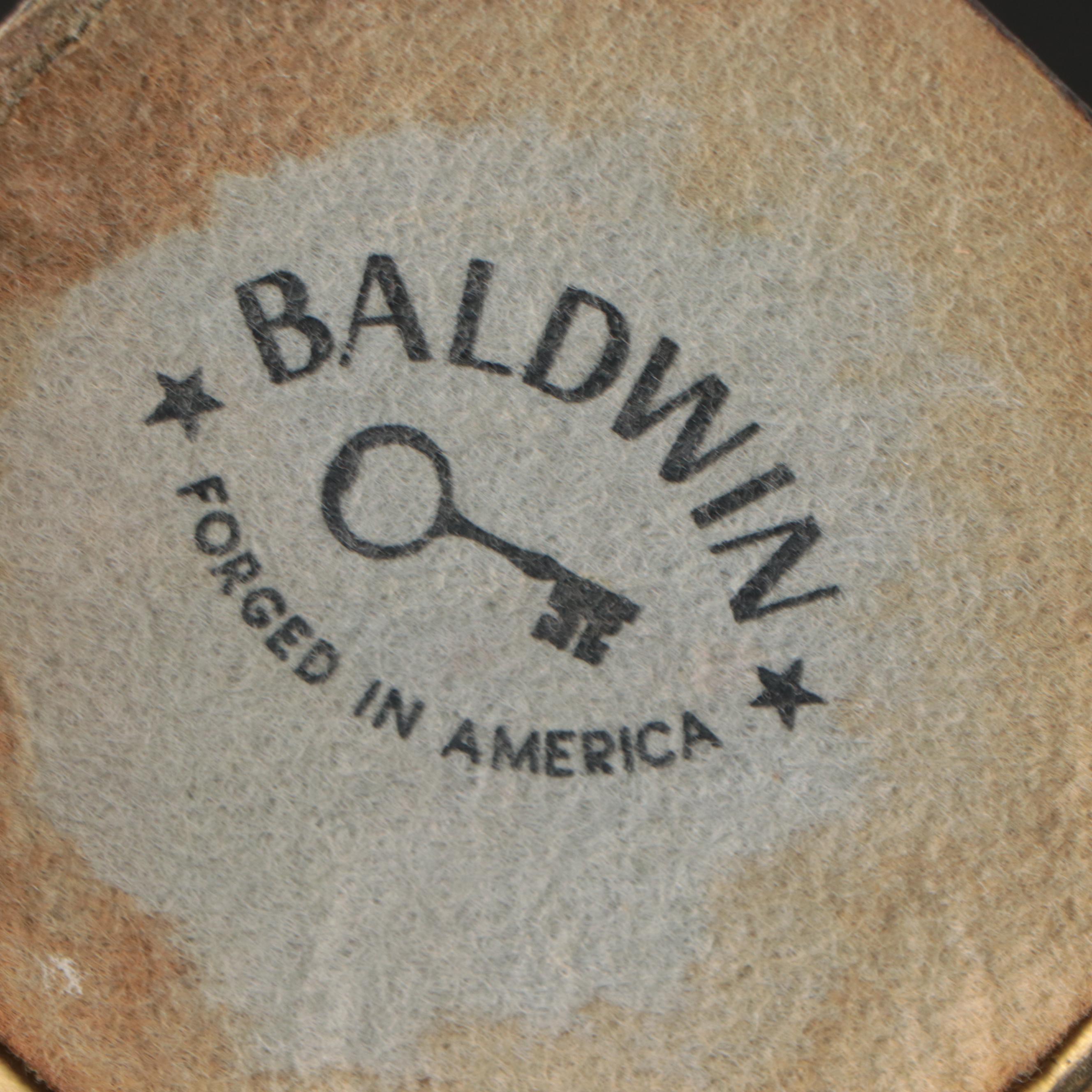 Virginia Metalcrafters "Kings Arms" with Other Brass Trivets and Candlesticks