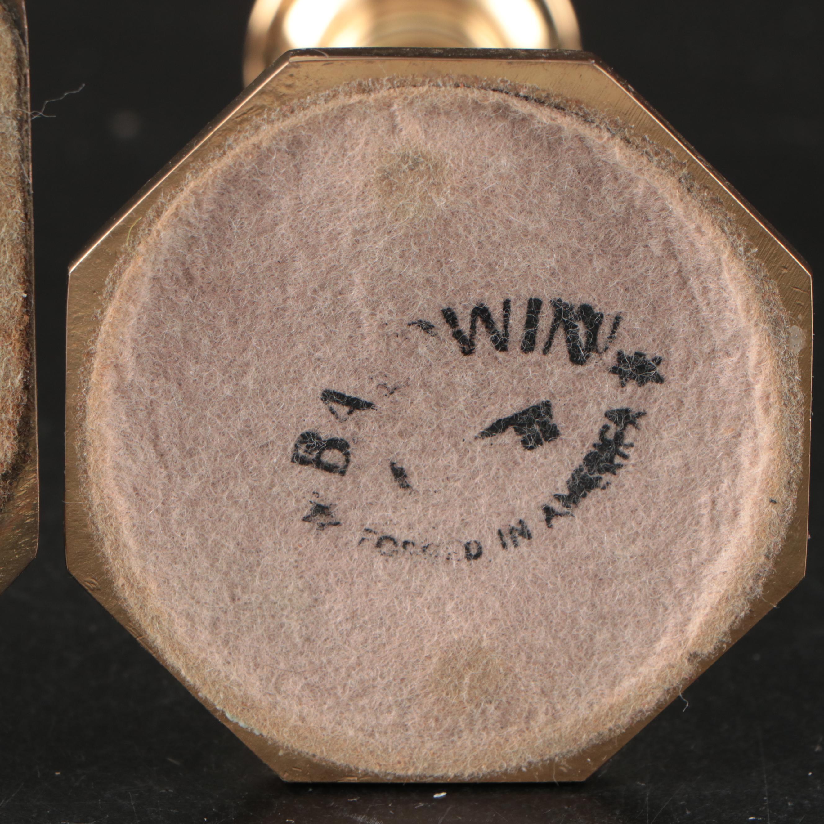 Virginia Metalcrafters "Kings Arms" with Other Brass Trivets and Candlesticks