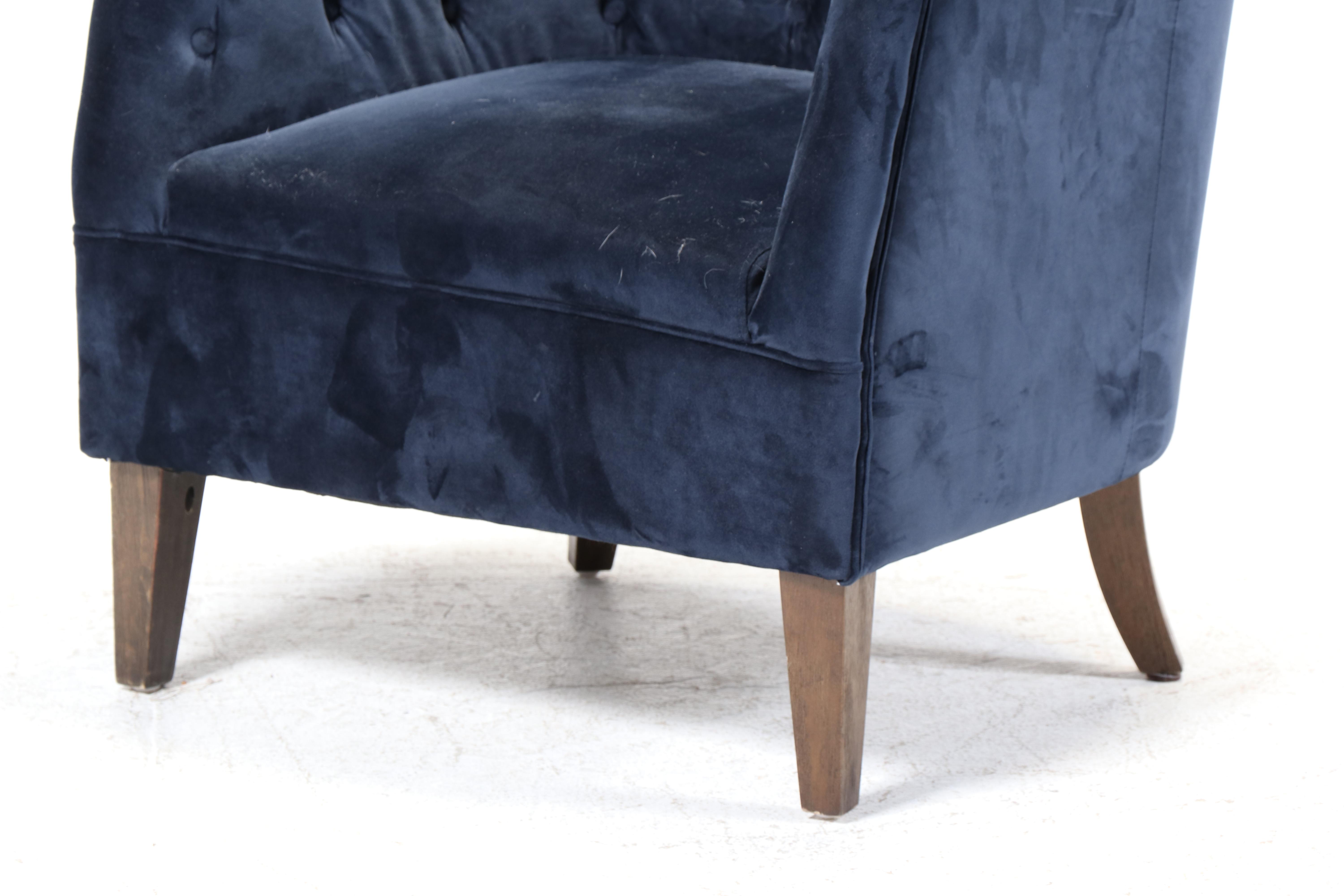 Classic Concepts Buttoned-Down Wing Chair Plus Patinated Metal Pharmacy Lamp