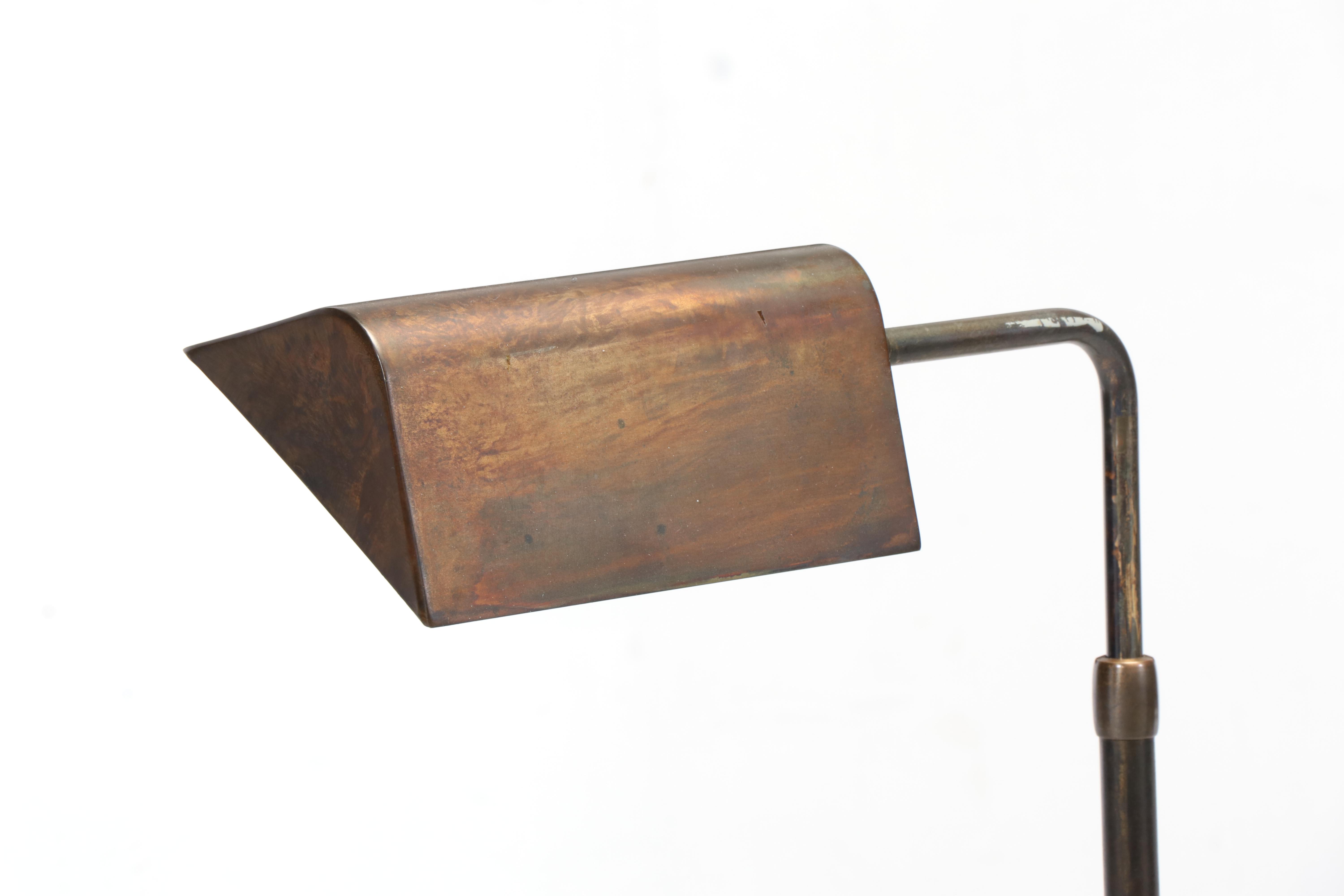 Classic Concepts Buttoned-Down Wing Chair Plus Patinated Metal Pharmacy Lamp