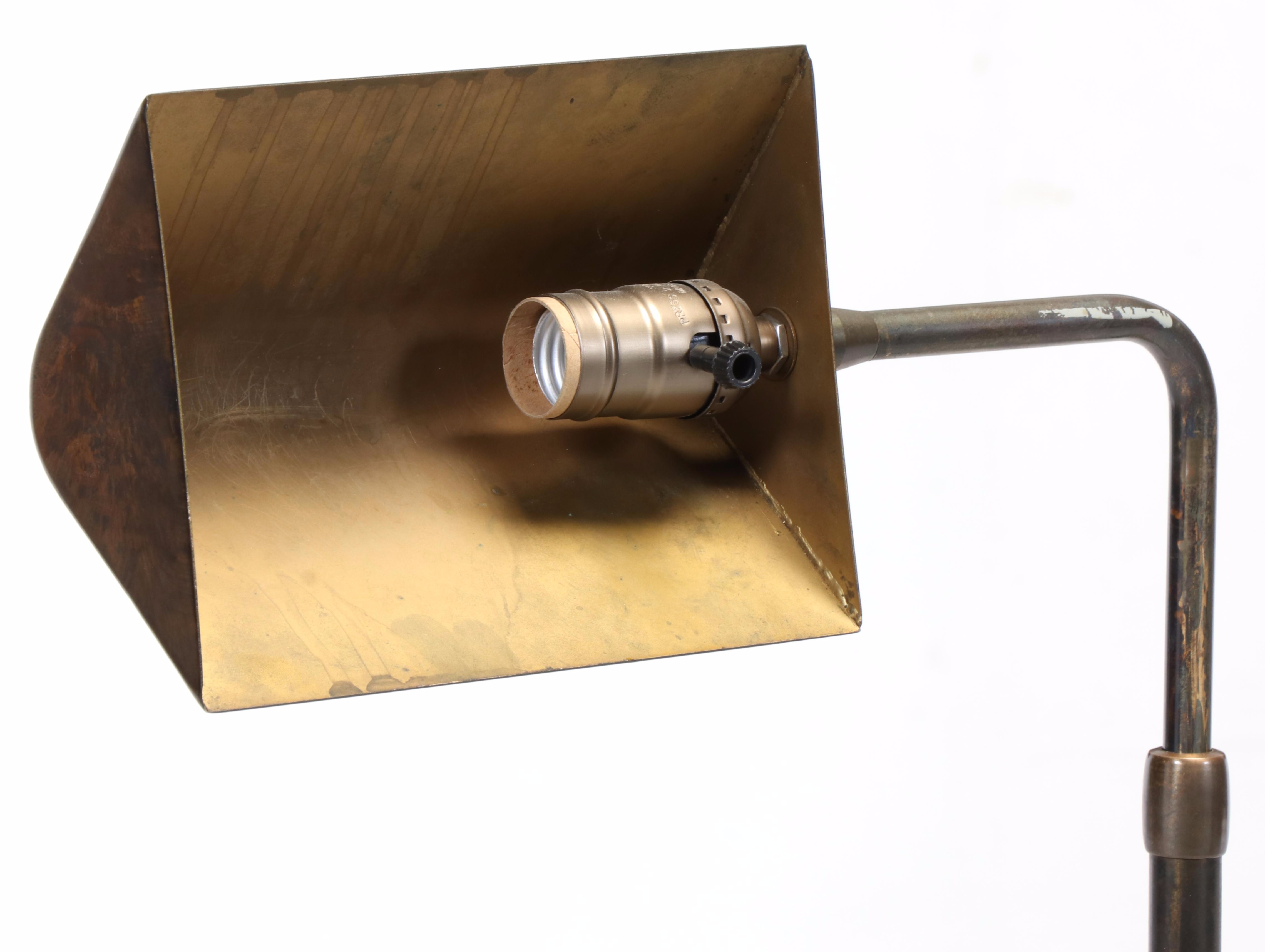 Classic Concepts Buttoned-Down Wing Chair Plus Patinated Metal Pharmacy Lamp