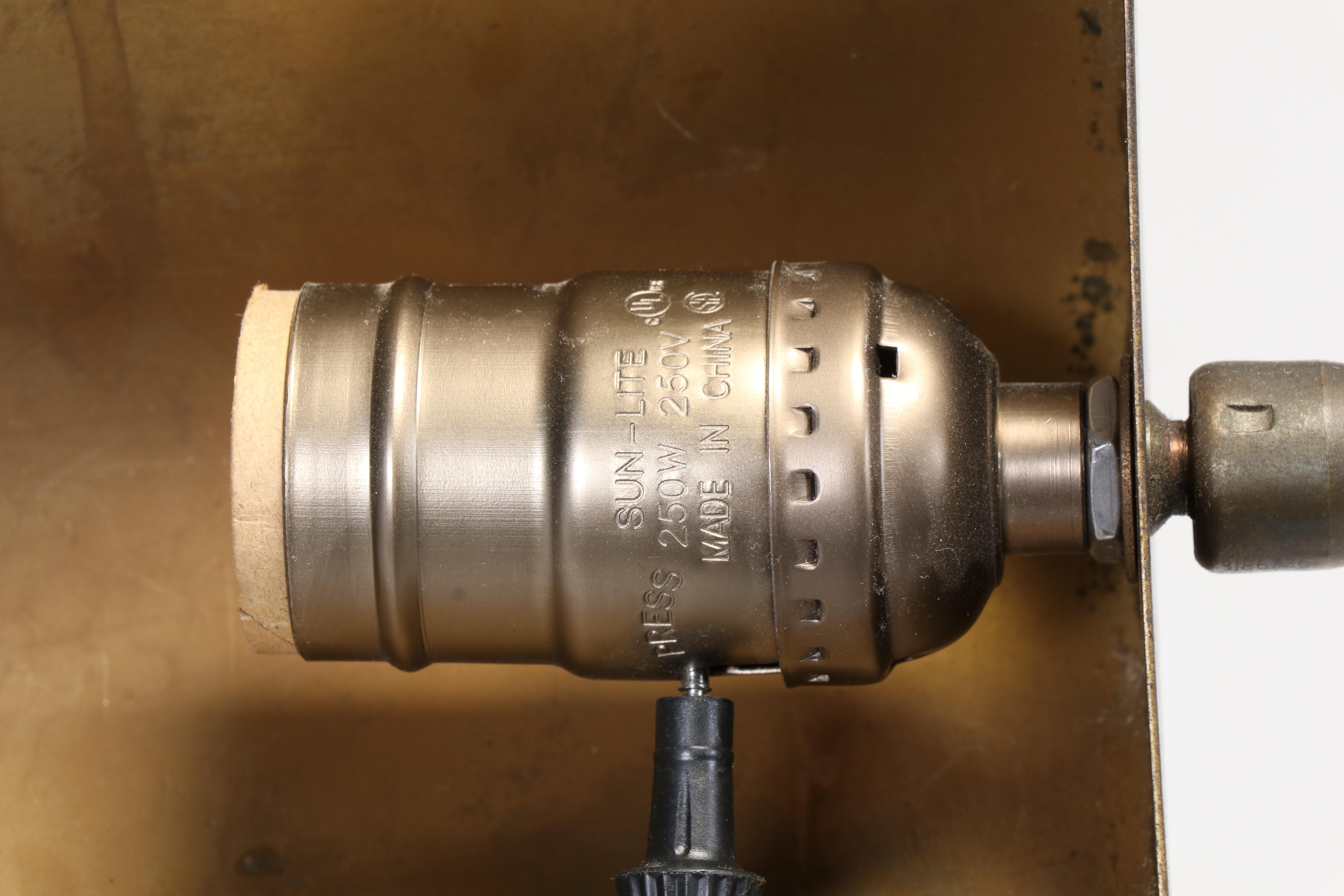 Classic Concepts Buttoned-Down Wing Chair Plus Patinated Metal Pharmacy Lamp