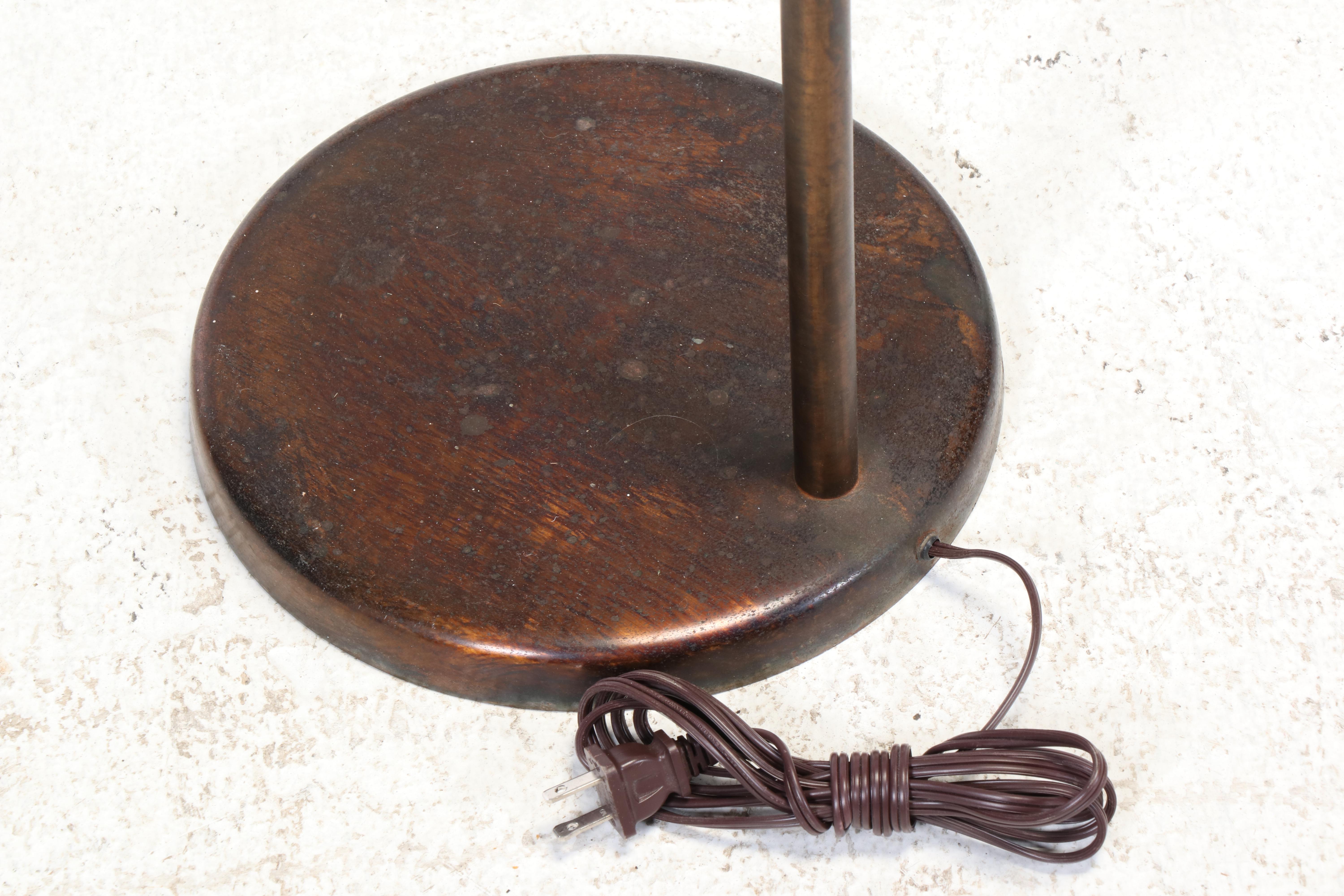Classic Concepts Buttoned-Down Wing Chair Plus Patinated Metal Pharmacy Lamp