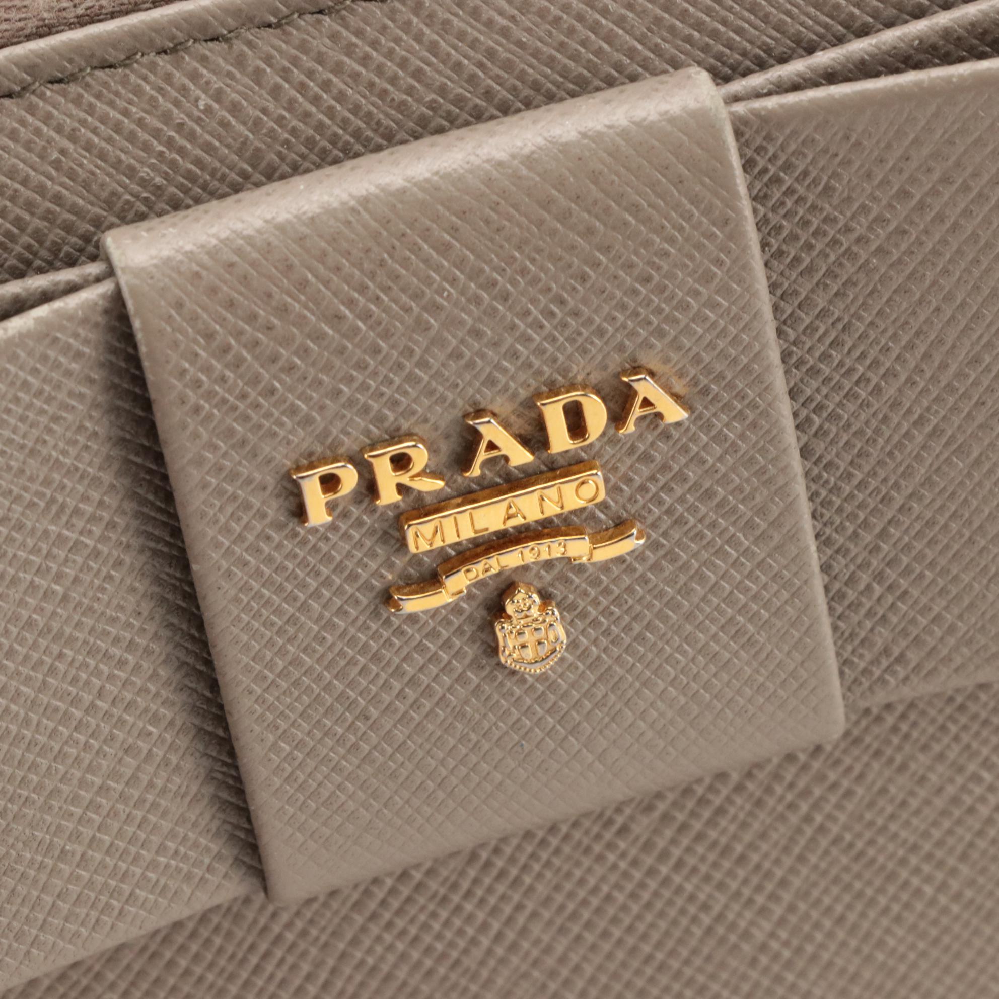 Prada Vera Bow Zip-Around Wallet in Argilla Saffiano Leather