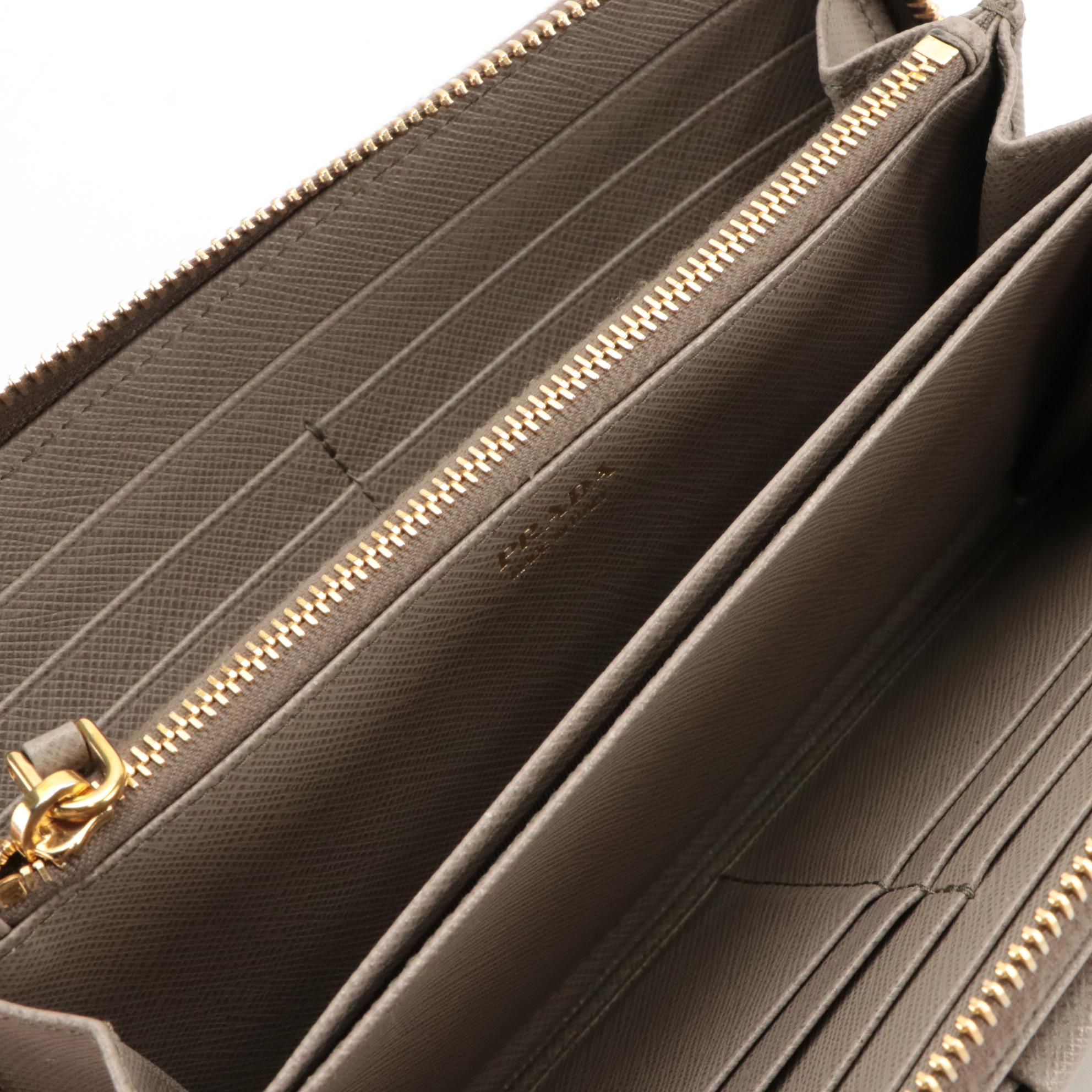 Prada Vera Bow Zip-Around Wallet in Argilla Saffiano Leather