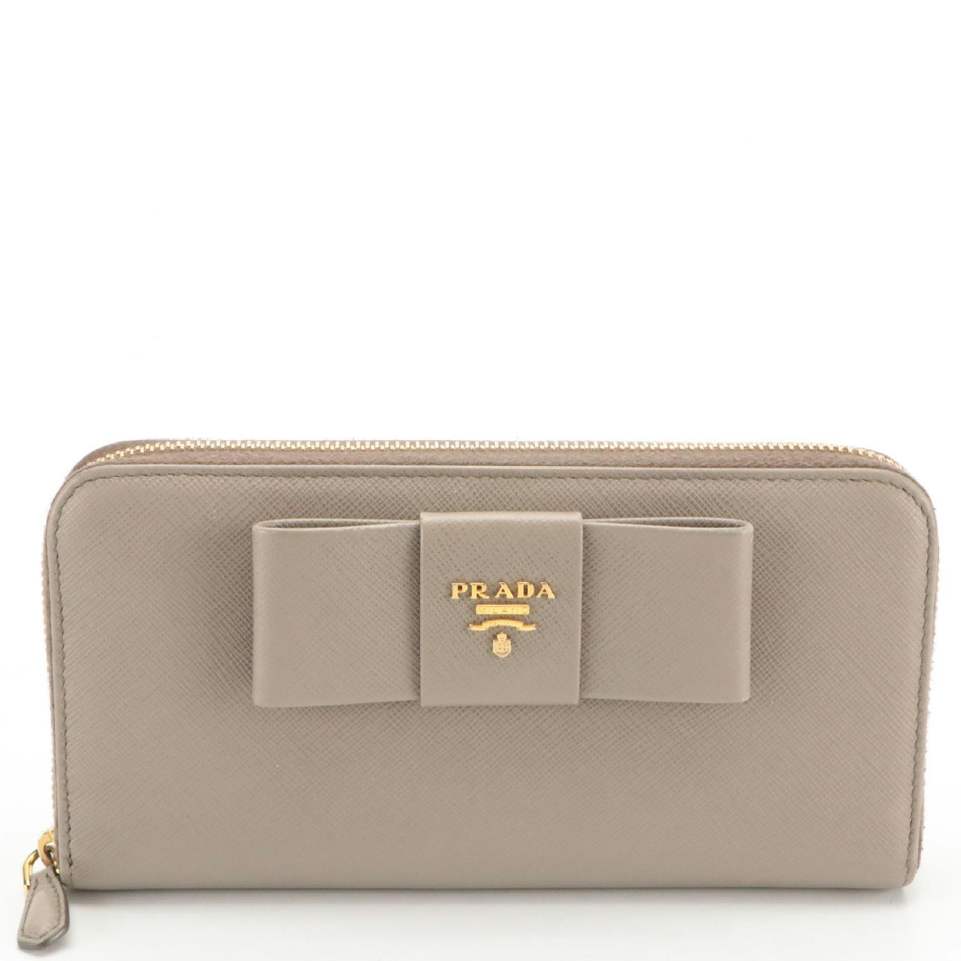 Prada Vera Bow Zip-Around Wallet in Argilla Saffiano Leather