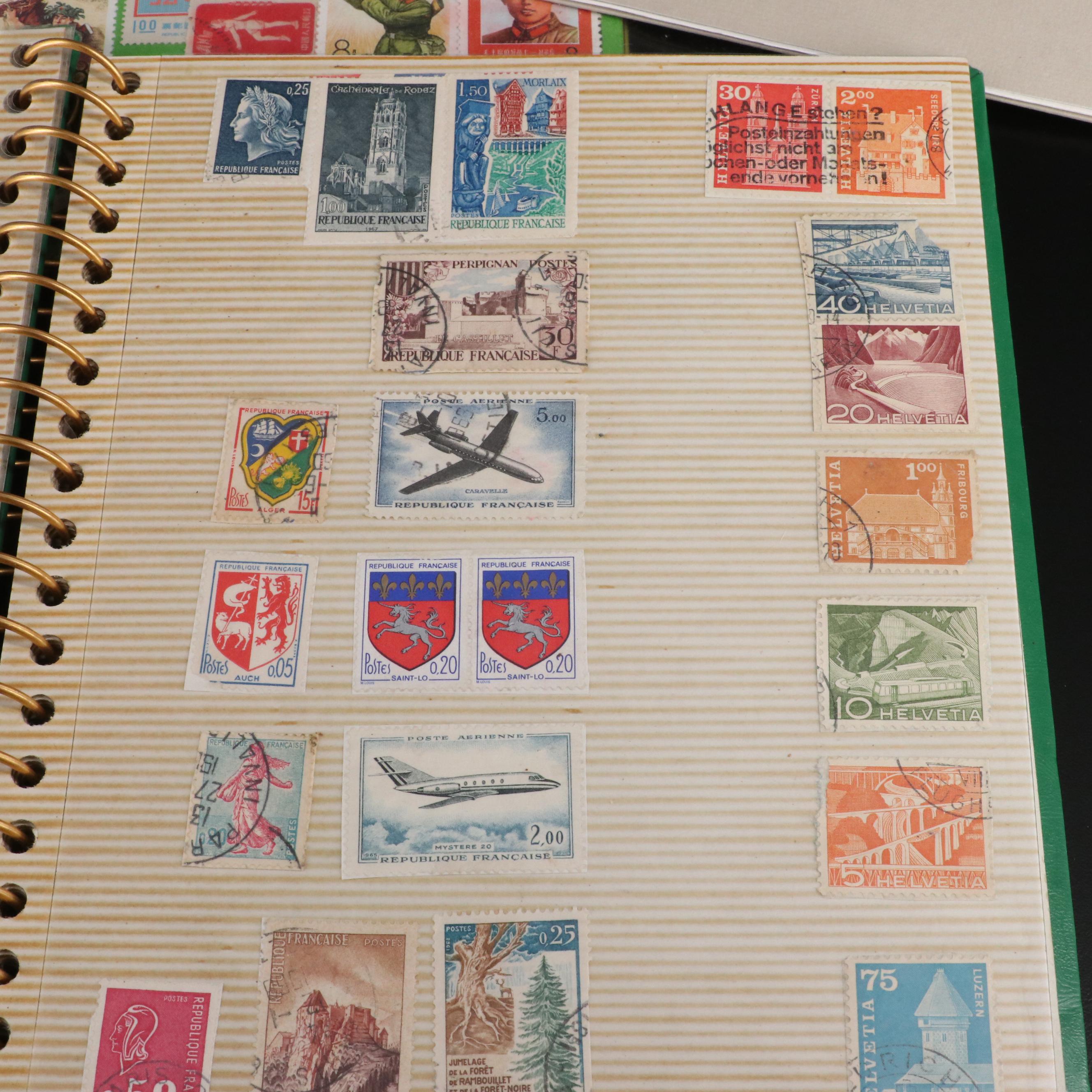 Two Chinese Postage Stamp Sets, an Album of World Stamps, and More