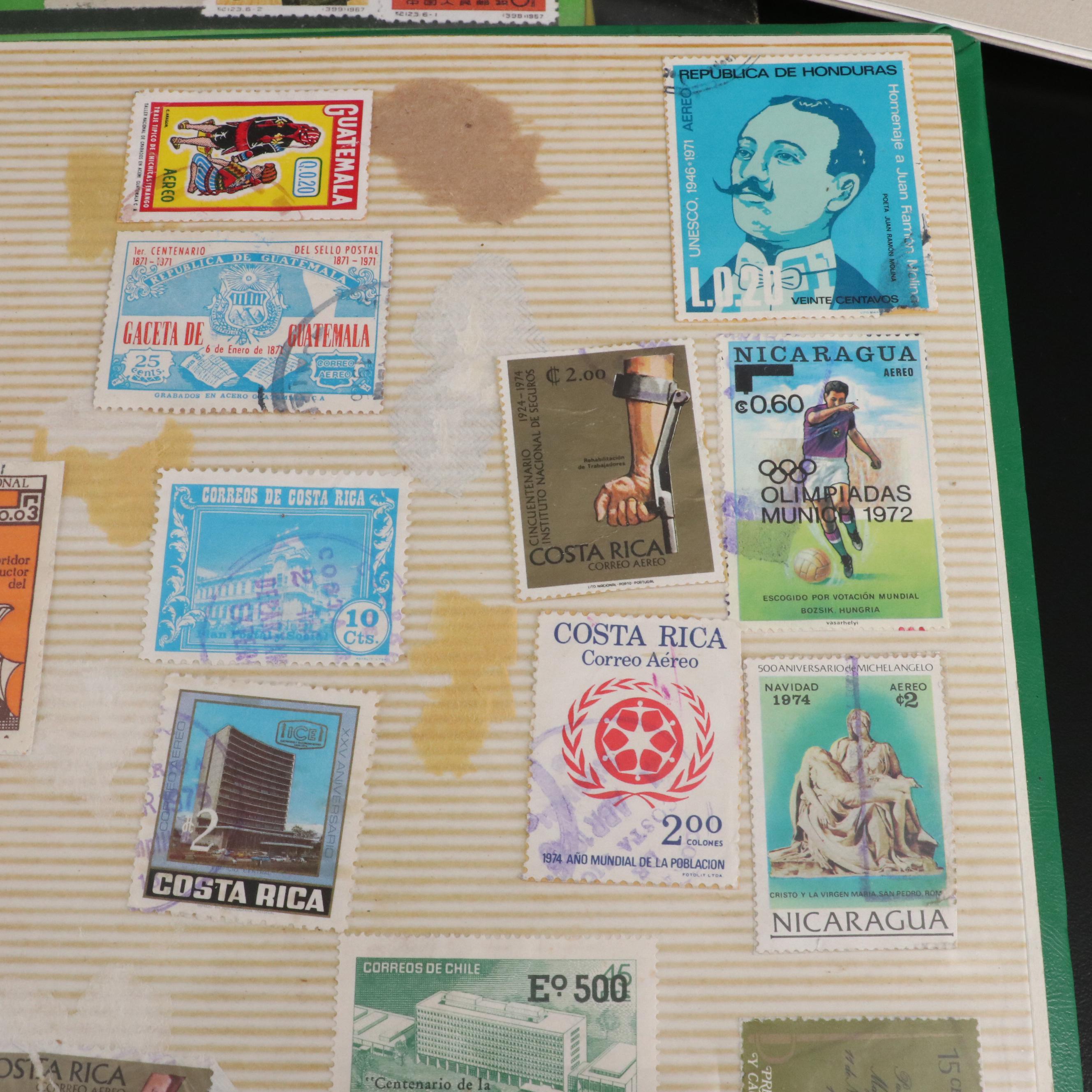 Two Chinese Postage Stamp Sets, an Album of World Stamps, and More