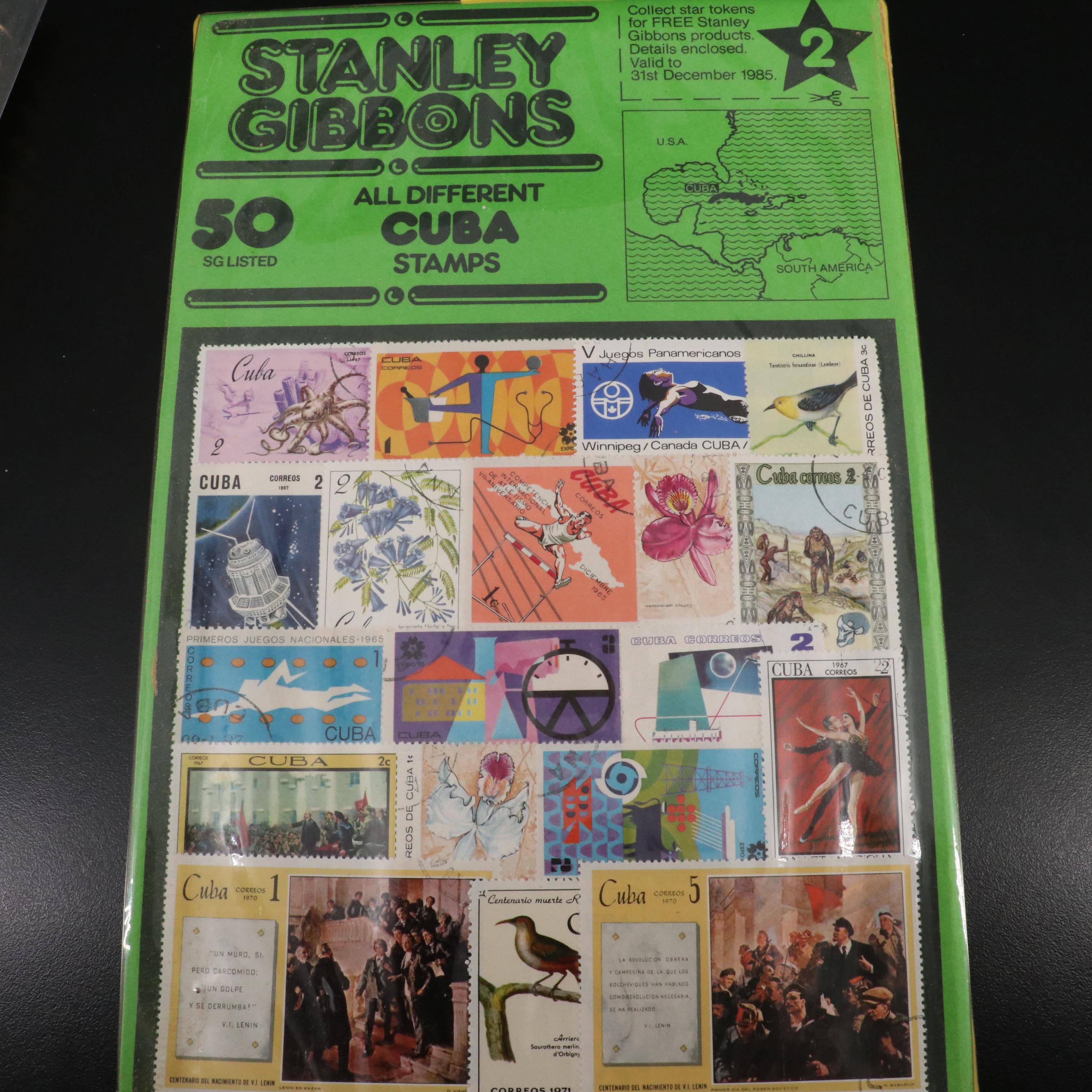 Two Chinese Postage Stamp Sets, an Album of World Stamps, and More