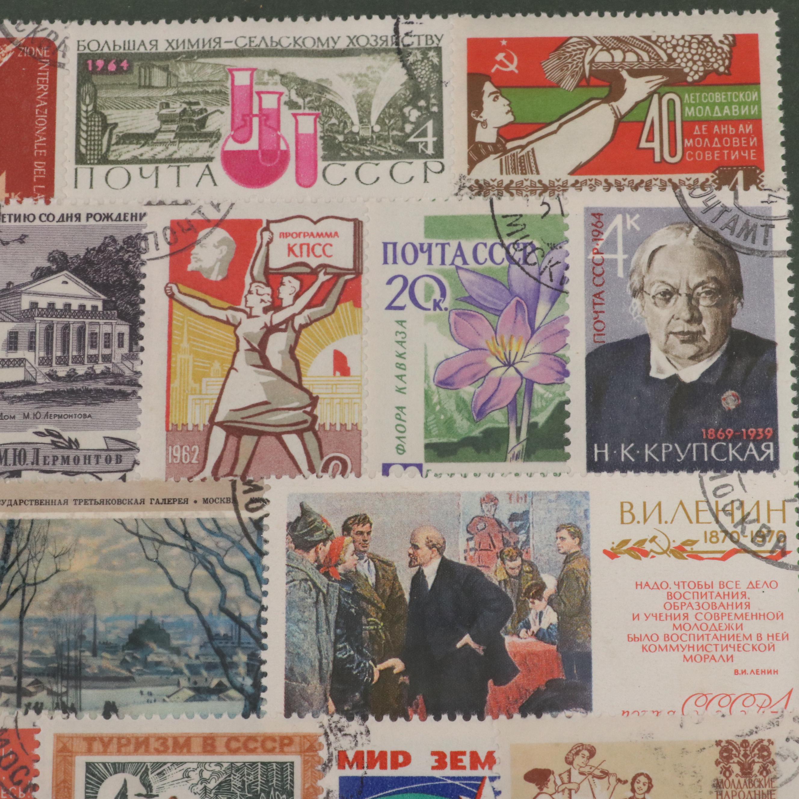 Two Chinese Postage Stamp Sets, an Album of World Stamps, and More
