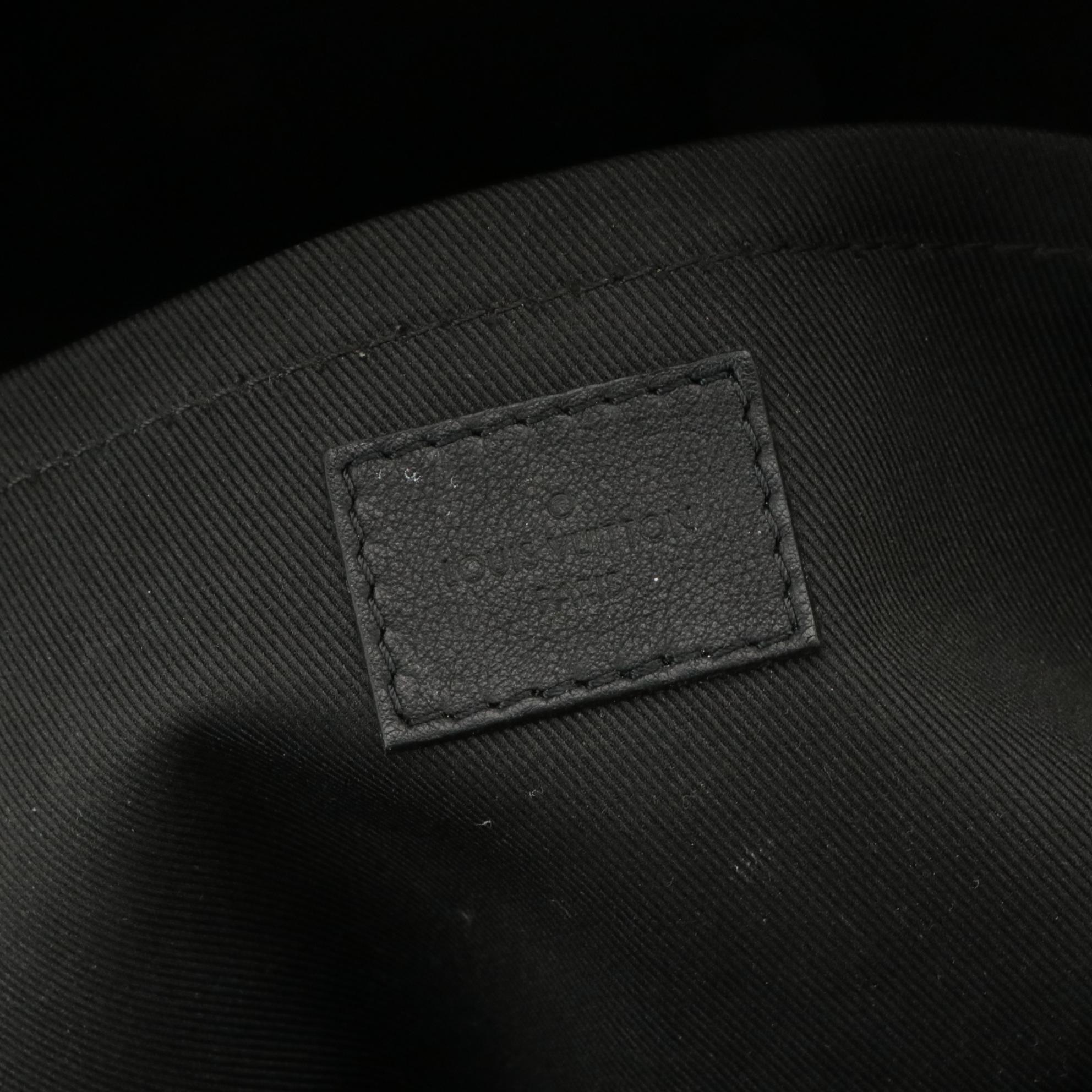 Louis Vuitton Palm Springs Backpack in Monogram Canvas and Black Leather Trim