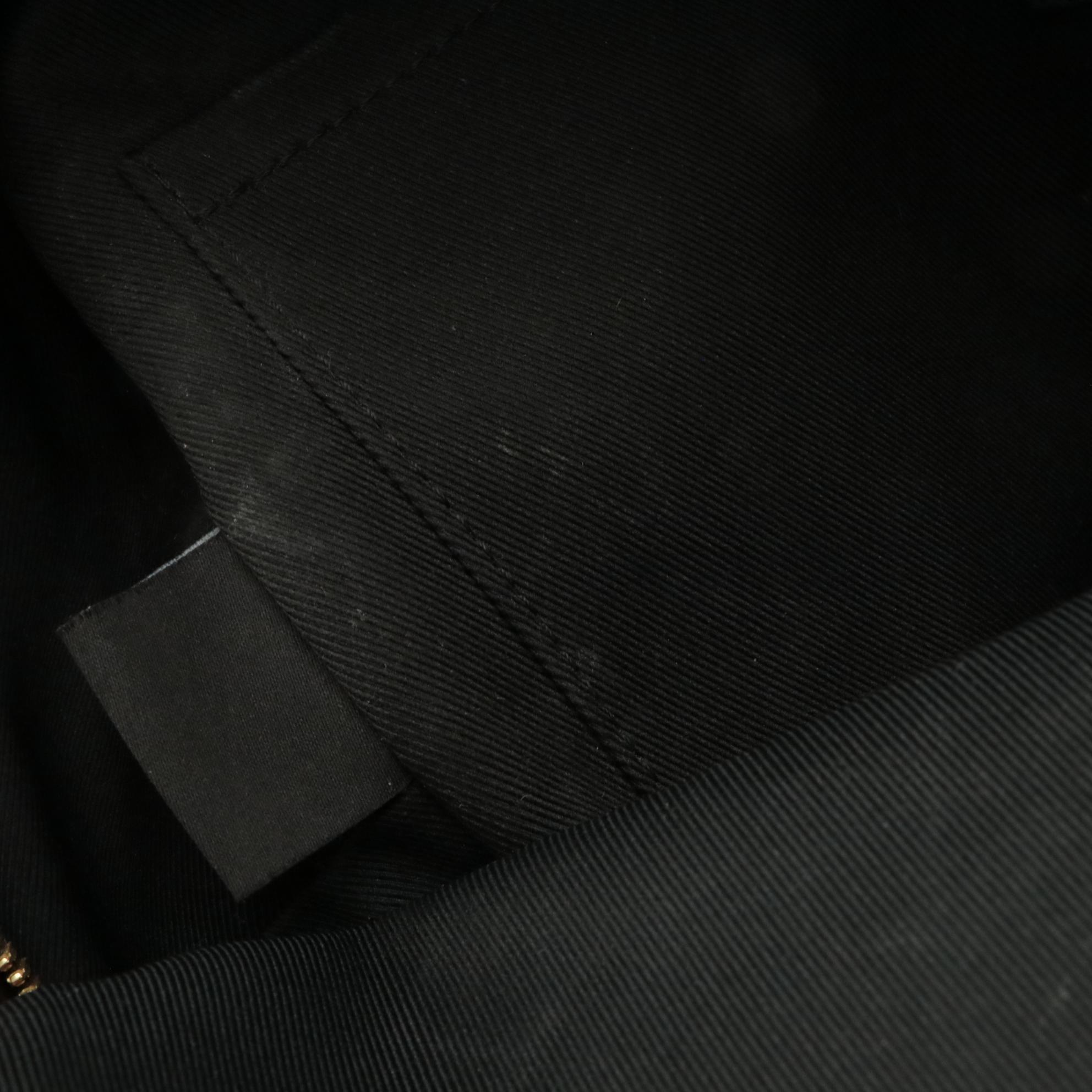 Louis Vuitton Palm Springs Backpack in Monogram Canvas and Black Leather Trim