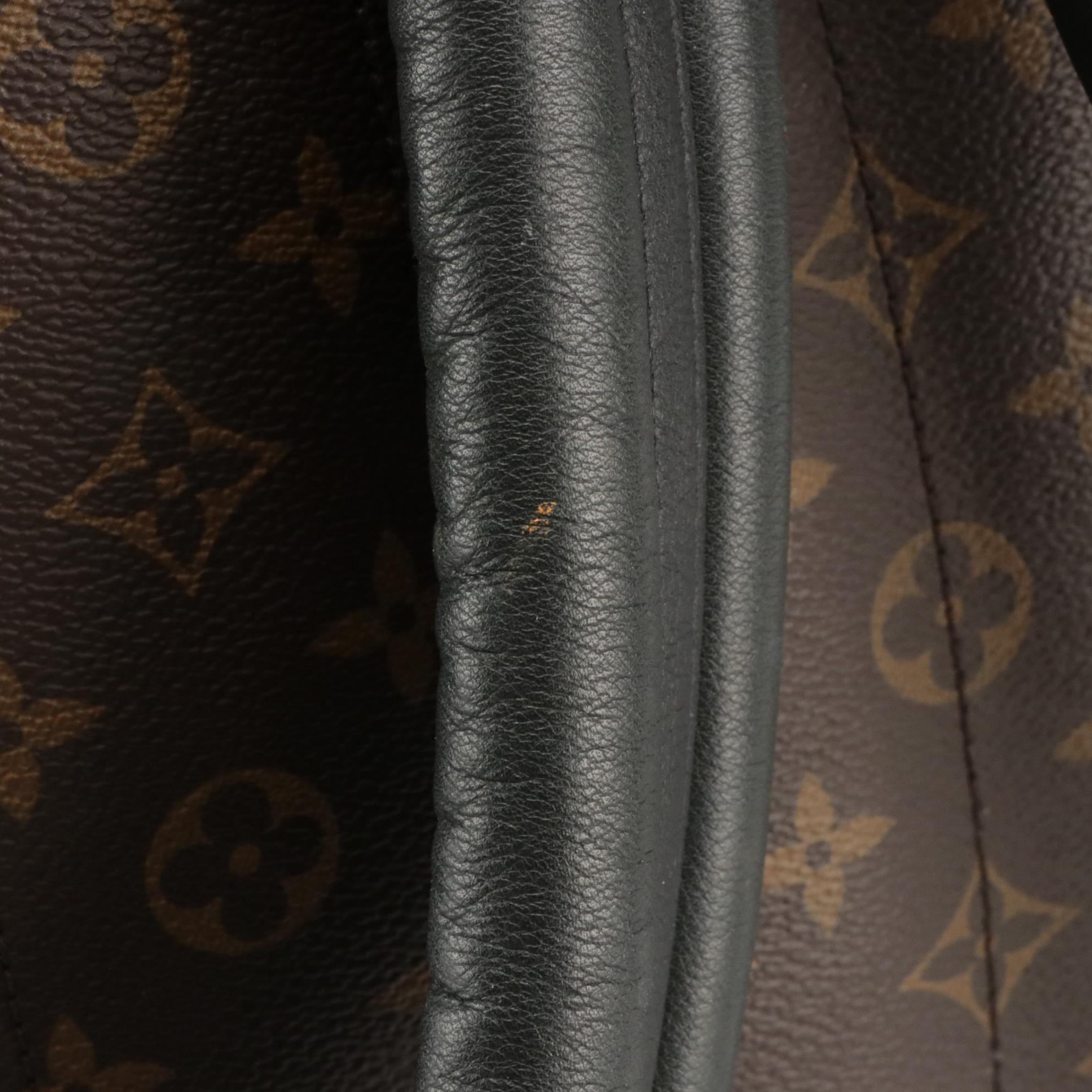 Louis Vuitton Palm Springs Backpack in Monogram Canvas and Black Leather Trim