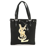 Yves Saint Laurent Parfums Metallic Logo Drawstring Zip Tote in Black Canvas