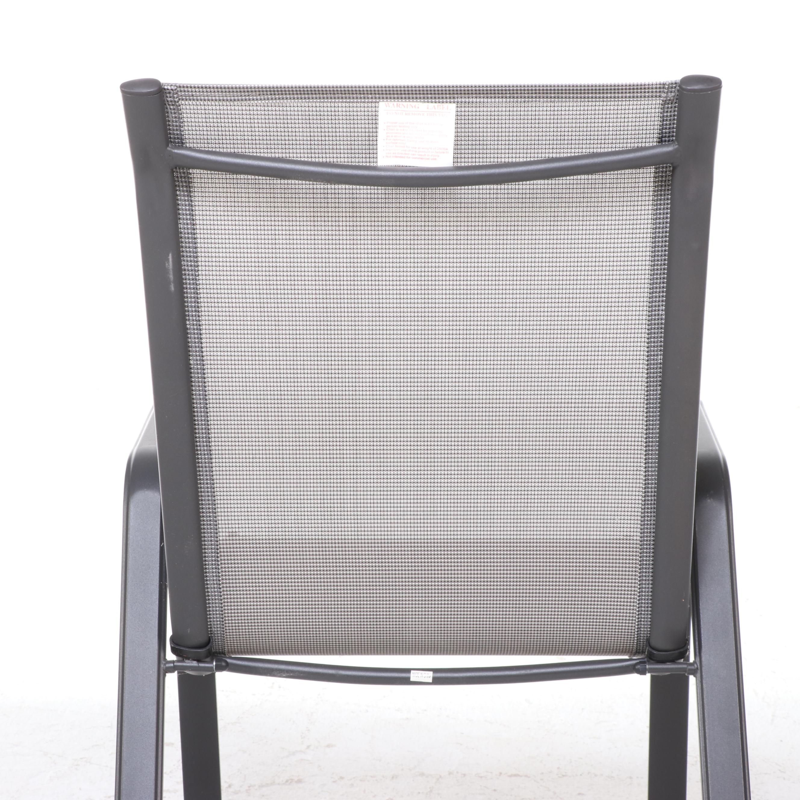 Two Cast Aluminum and Mesh Patio Chairs