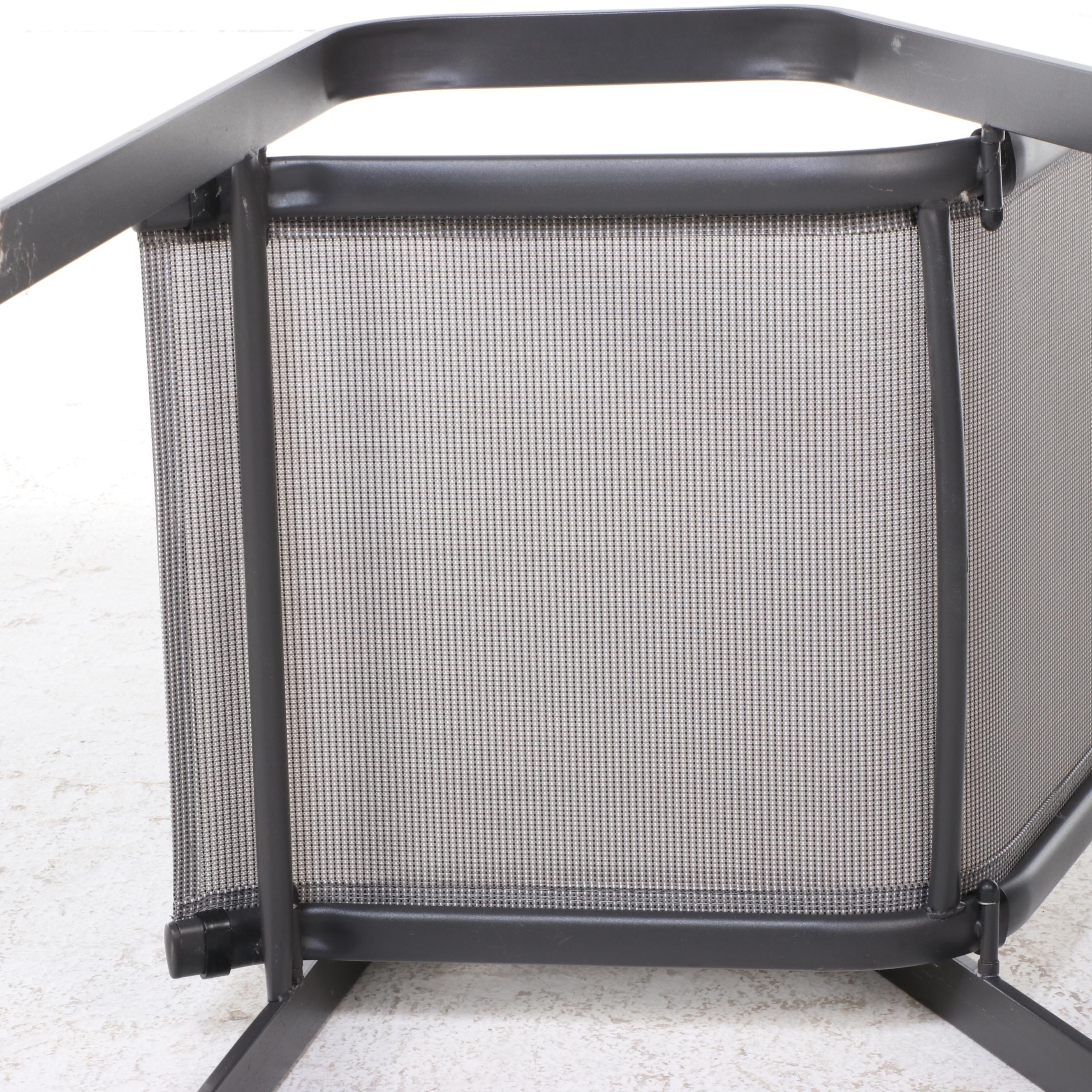 Two Cast Aluminum and Mesh Patio Chairs