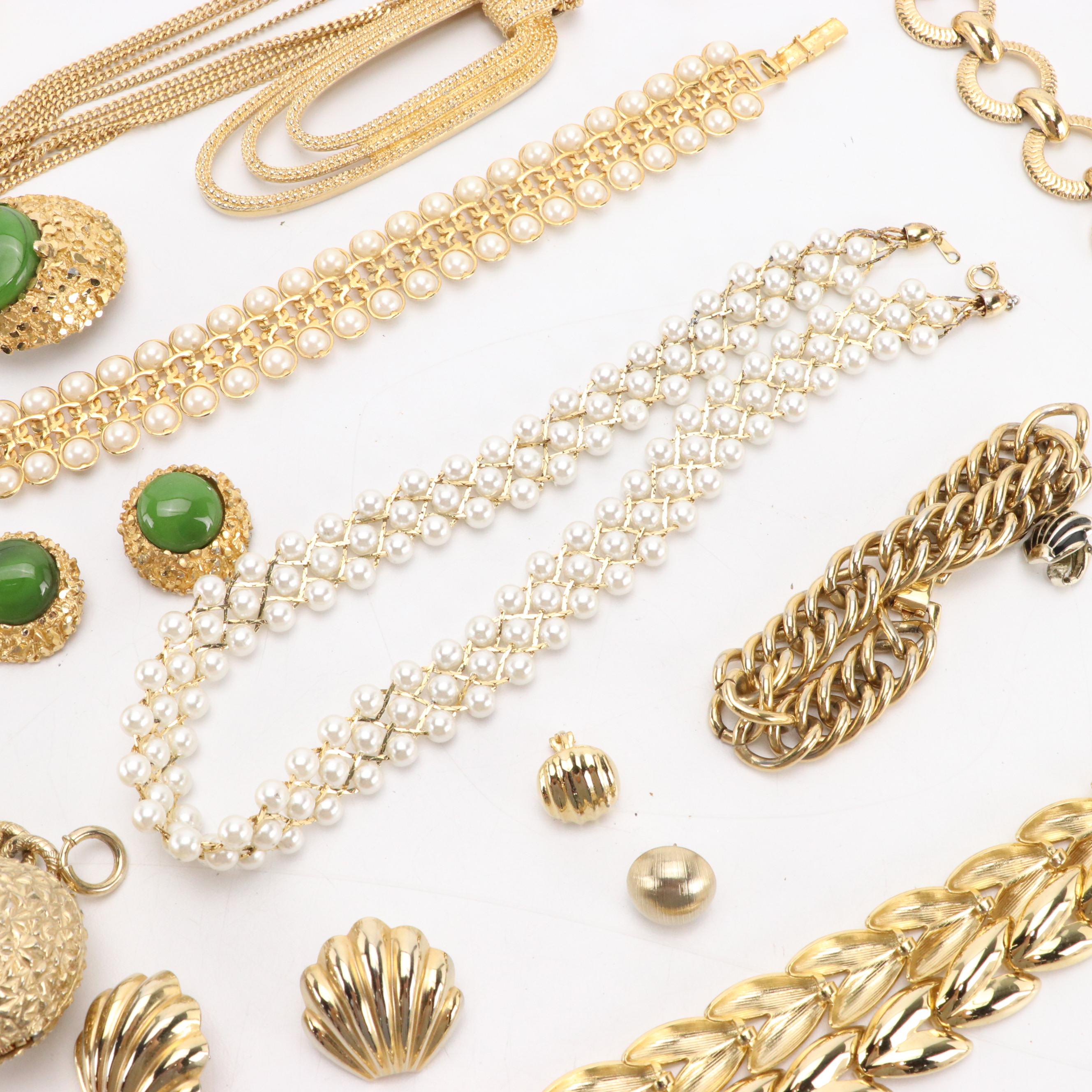Assorted Gold-Tone Jewelry Including Monet, Avon, Napier, Trifari, and More