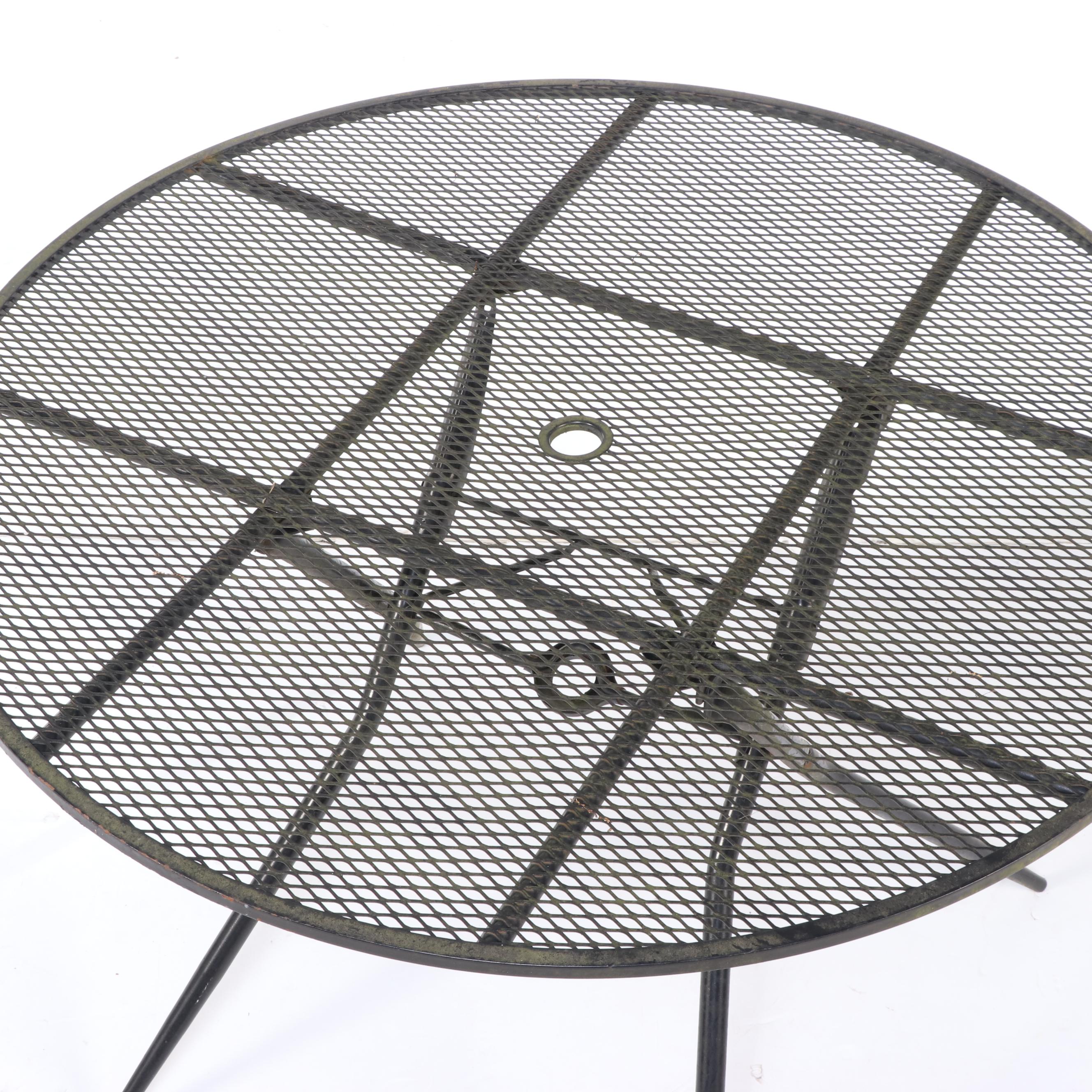 Four Wrought Iron Patio Dining Chairs and Table