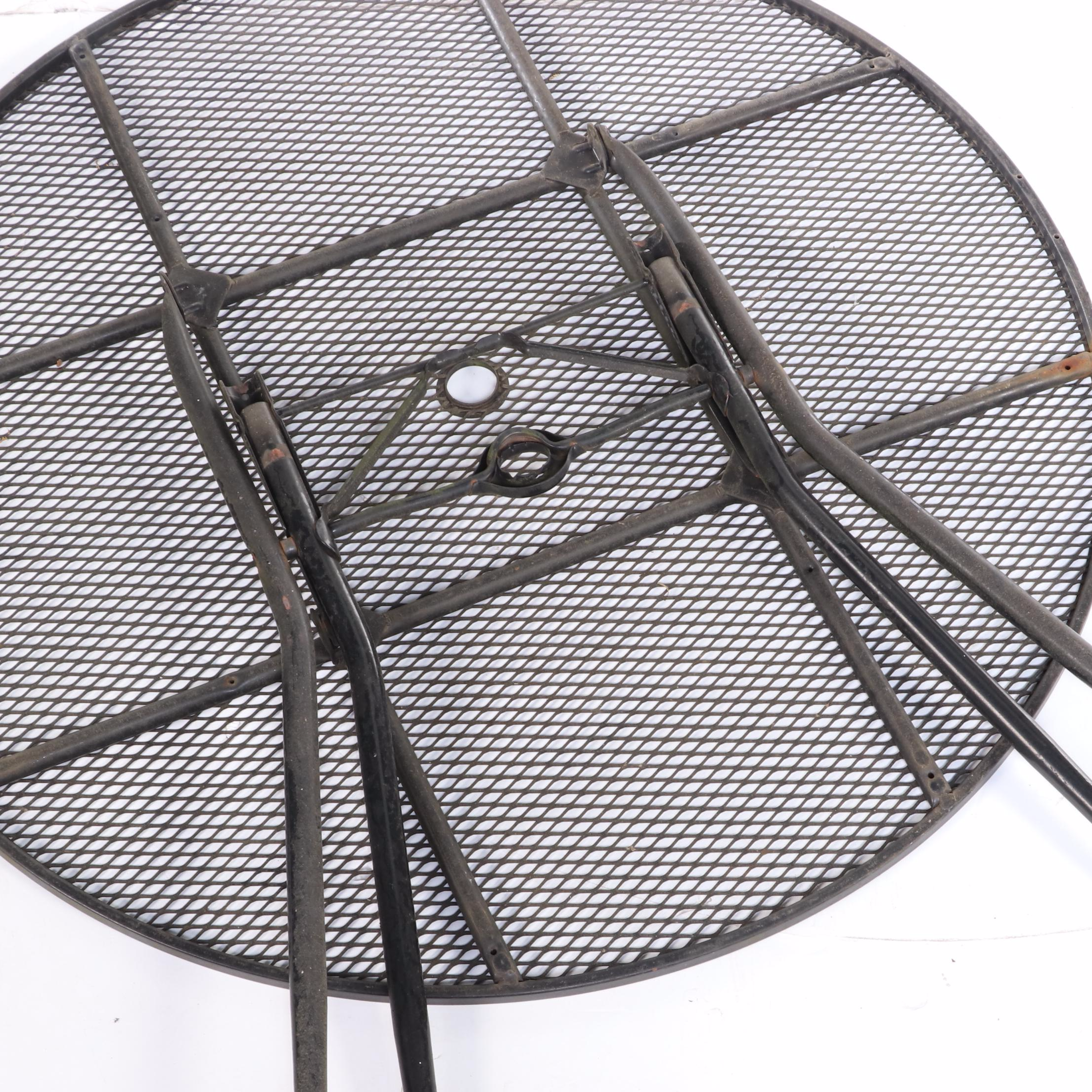 Four Wrought Iron Patio Dining Chairs and Table