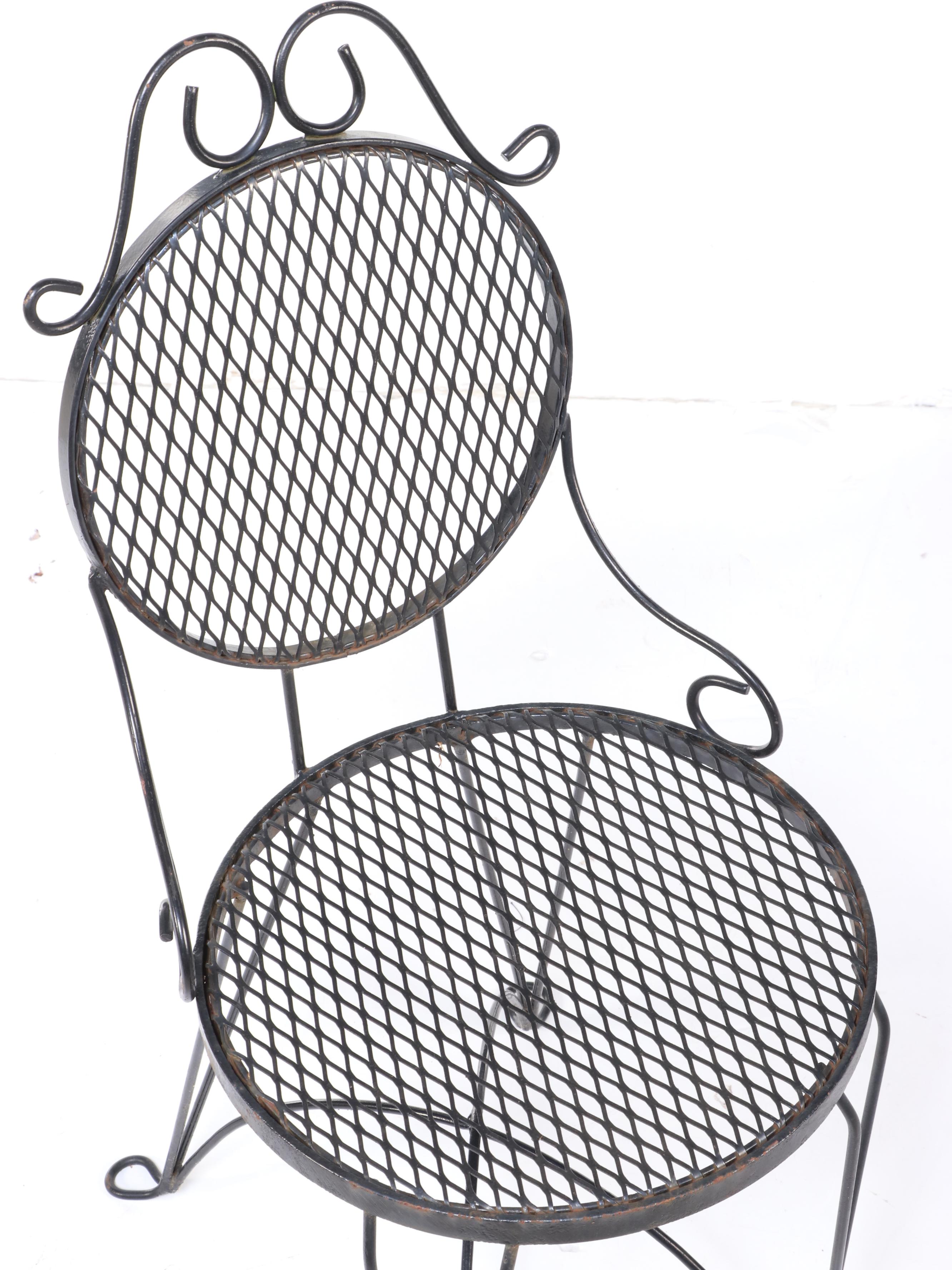 Four Wrought Iron Patio Dining Chairs and Table