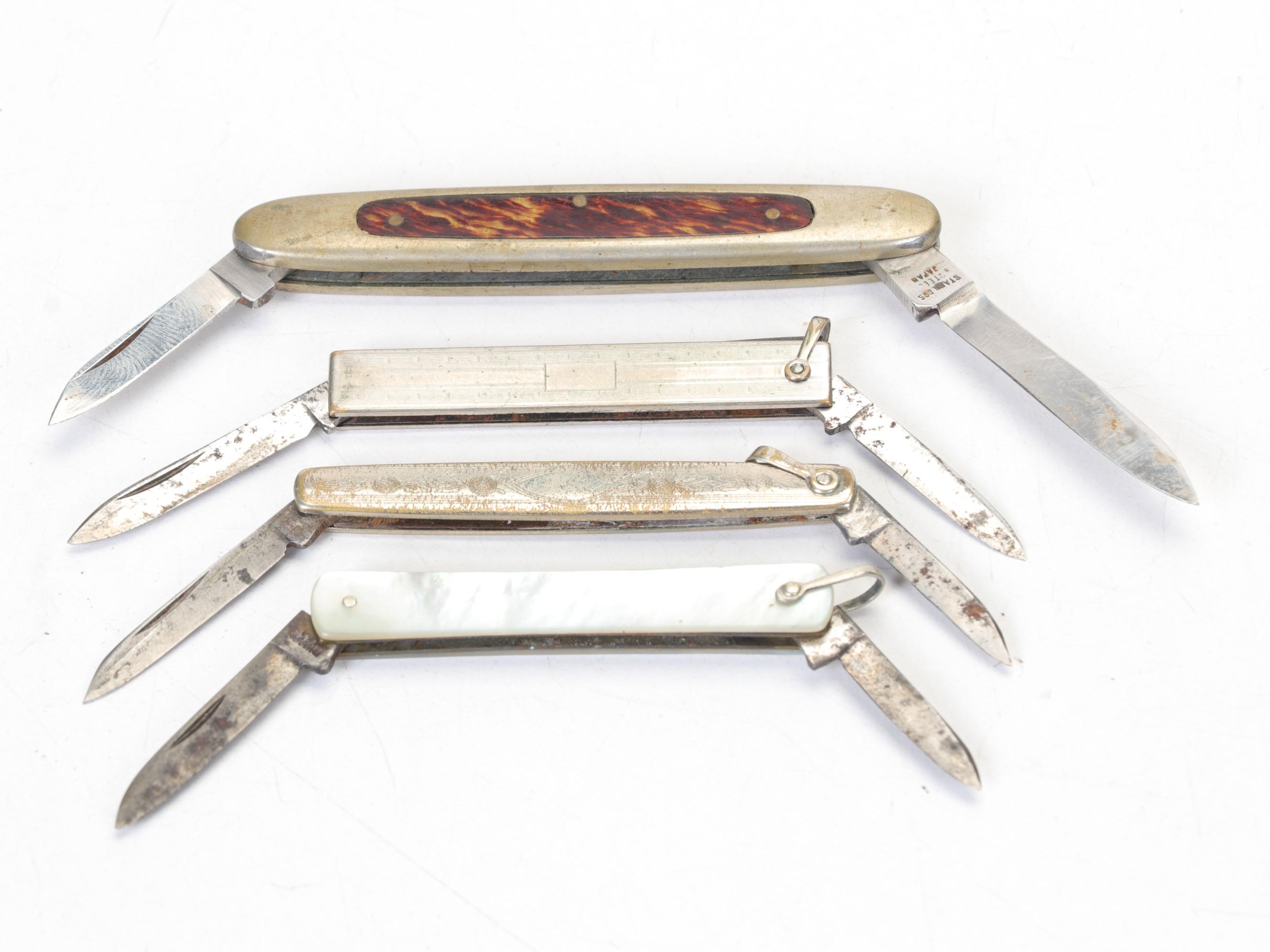 Fifteen Small Folding Pocket Knives