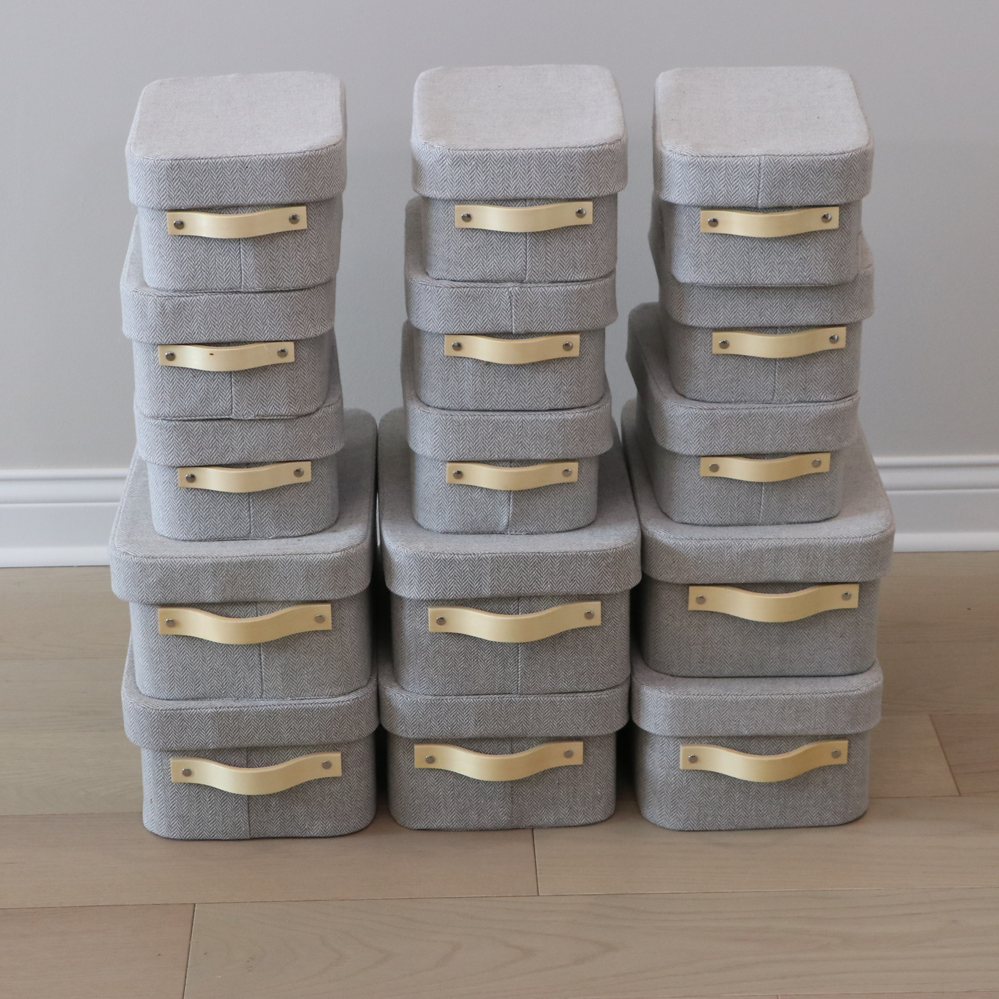 Fifteen Cloth-Covered Storage Boxes