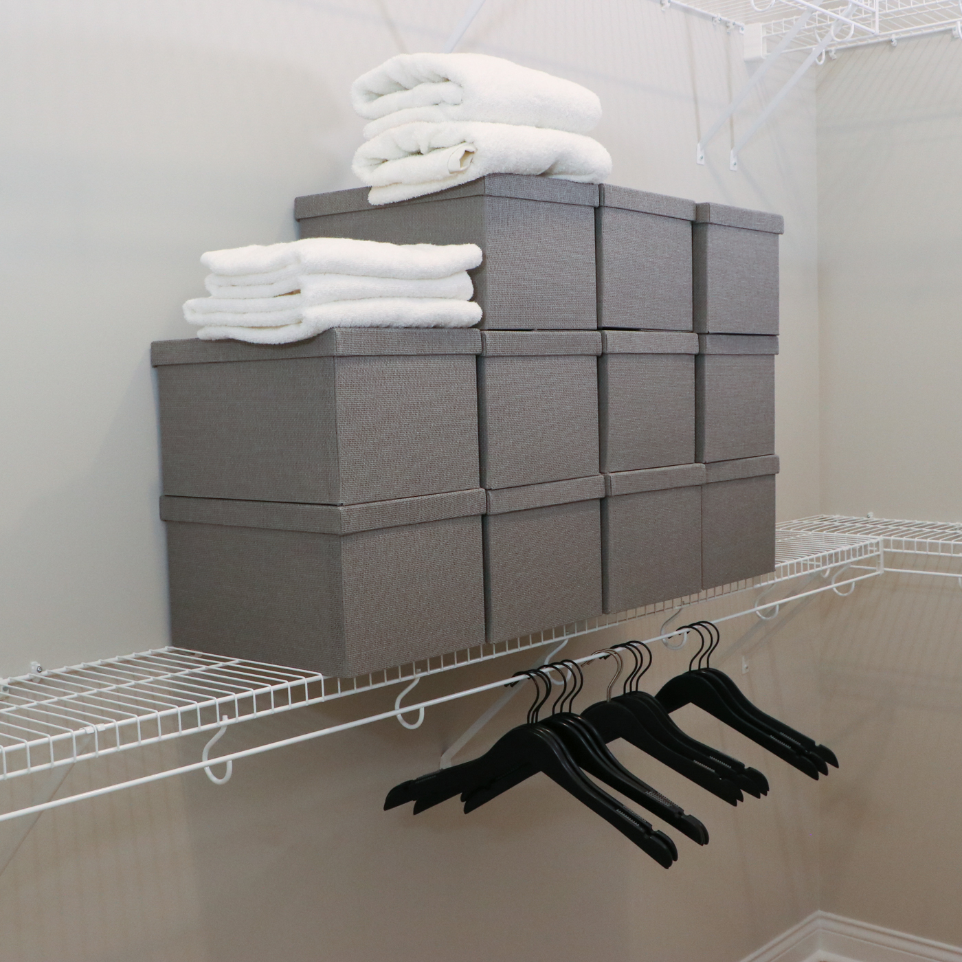 Grey Fabric Shoe Storage Cubes with Bath Linens and Clothes Hangers