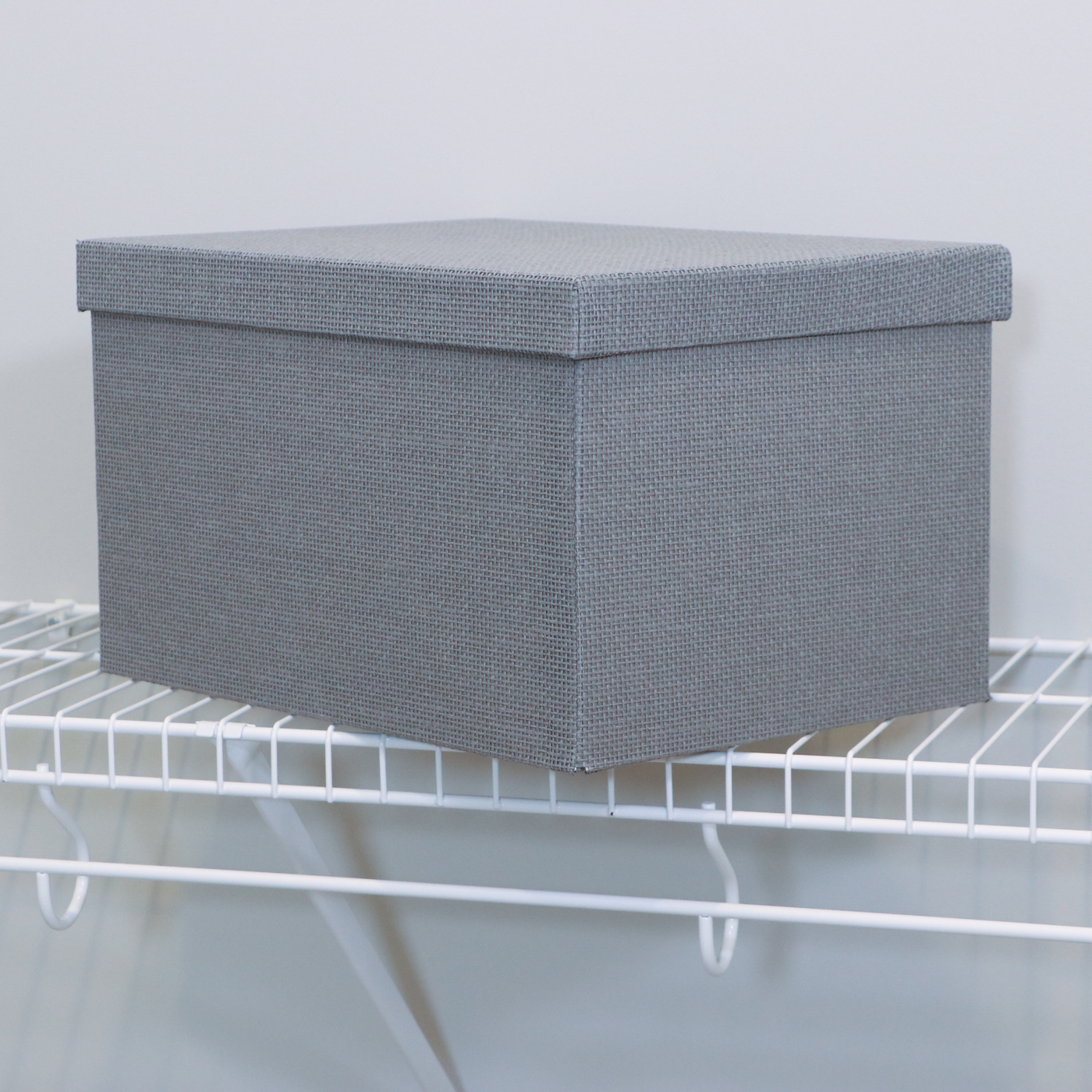 Grey Fabric Shoe Storage Cubes with Bath Linens and Clothes Hangers