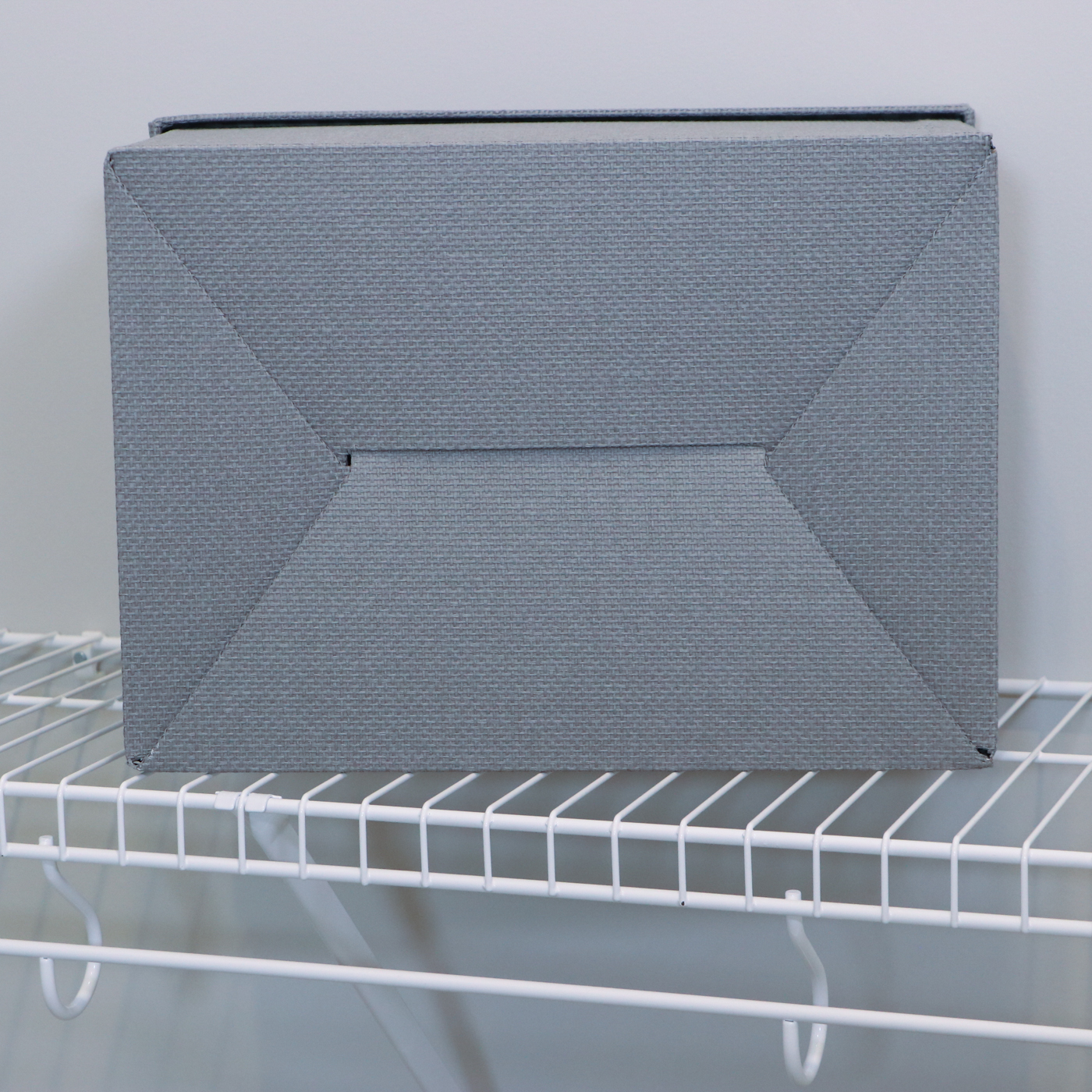 Grey Fabric Shoe Storage Cubes with Bath Linens and Clothes Hangers