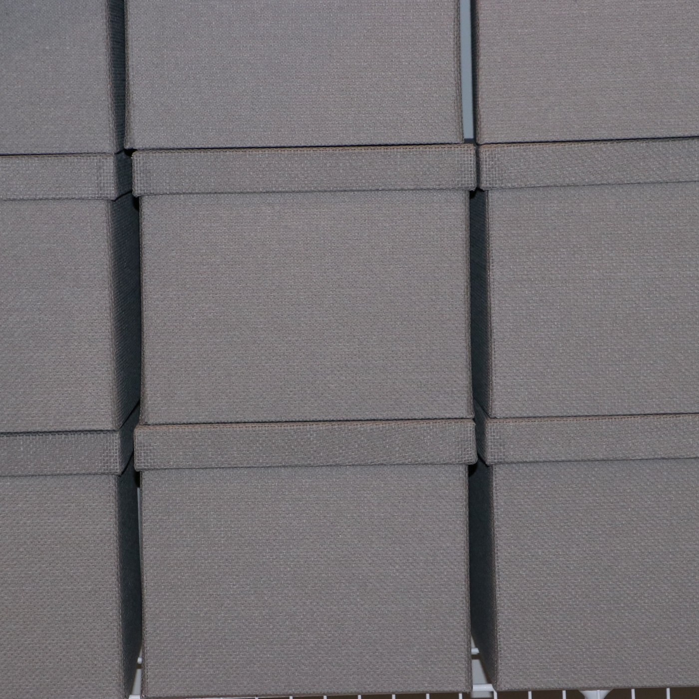 Grey Fabric Shoe Storage Cubes with Bath Linens and Clothes Hangers