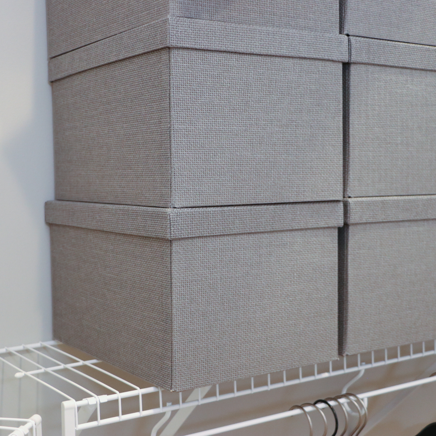 Grey Fabric Shoe Storage Cubes with Bath Linens and Clothes Hangers