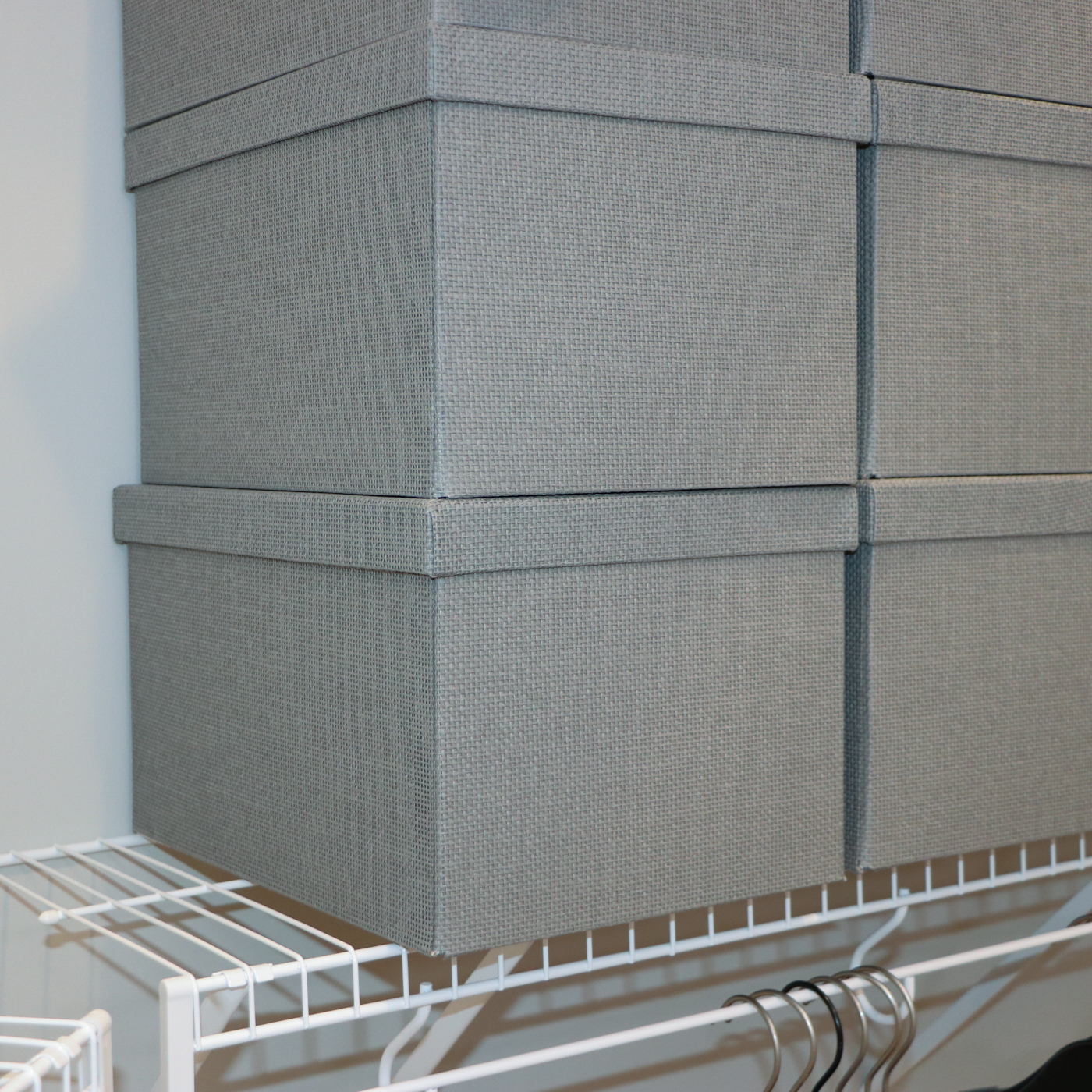 Grey Fabric Shoe Storage Cubes with Bath Linens and Clothes Hangers