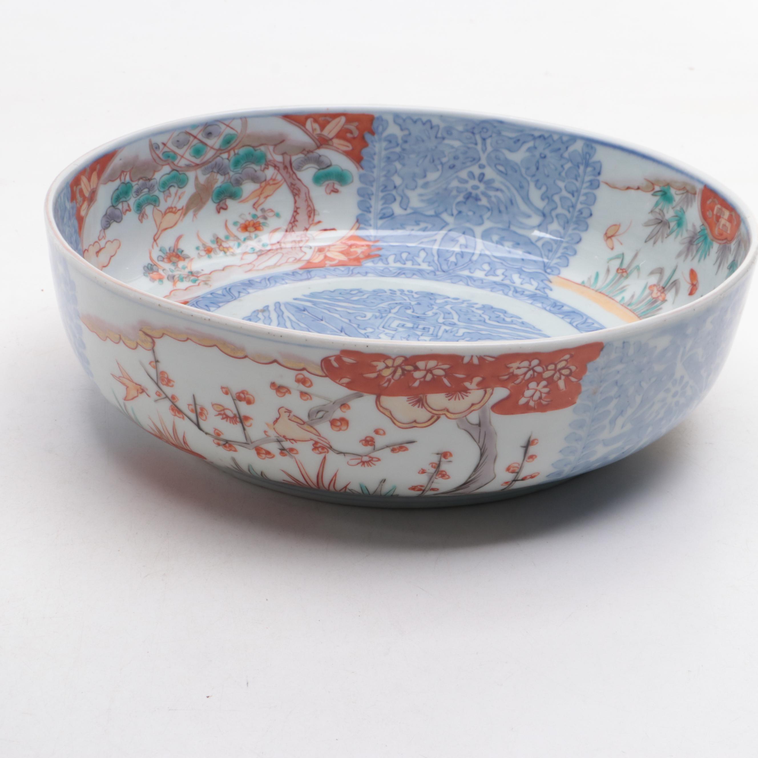 Japanese Imari Porcelain Bowl with Carved Stand